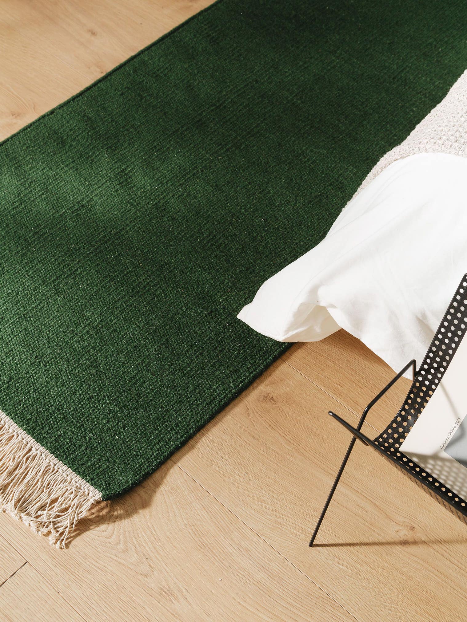 Teppich aus 80% Wolle, 20% Baumwolle in Grün mit bis 5 mm hohem Flor von benuta Pop