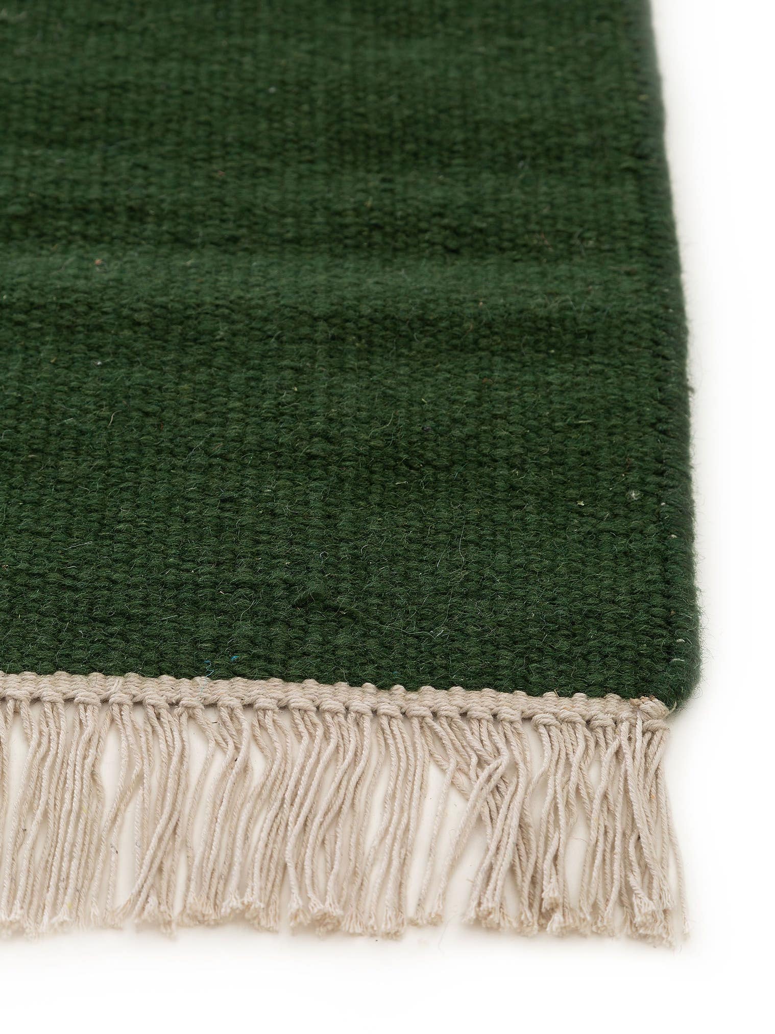Teppich aus 80% Wolle, 20% Baumwolle in Grün mit bis 5 mm hohem Flor von benuta Pop
