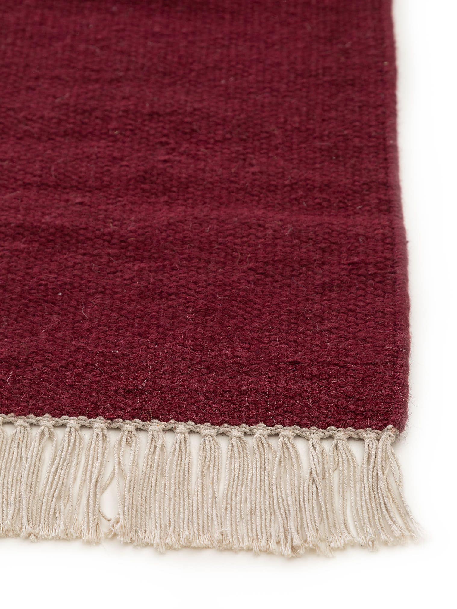 Teppich aus 80% Wolle, 20% Baumwolle in Rot mit bis 5 mm hohem Flor von benuta Pop
