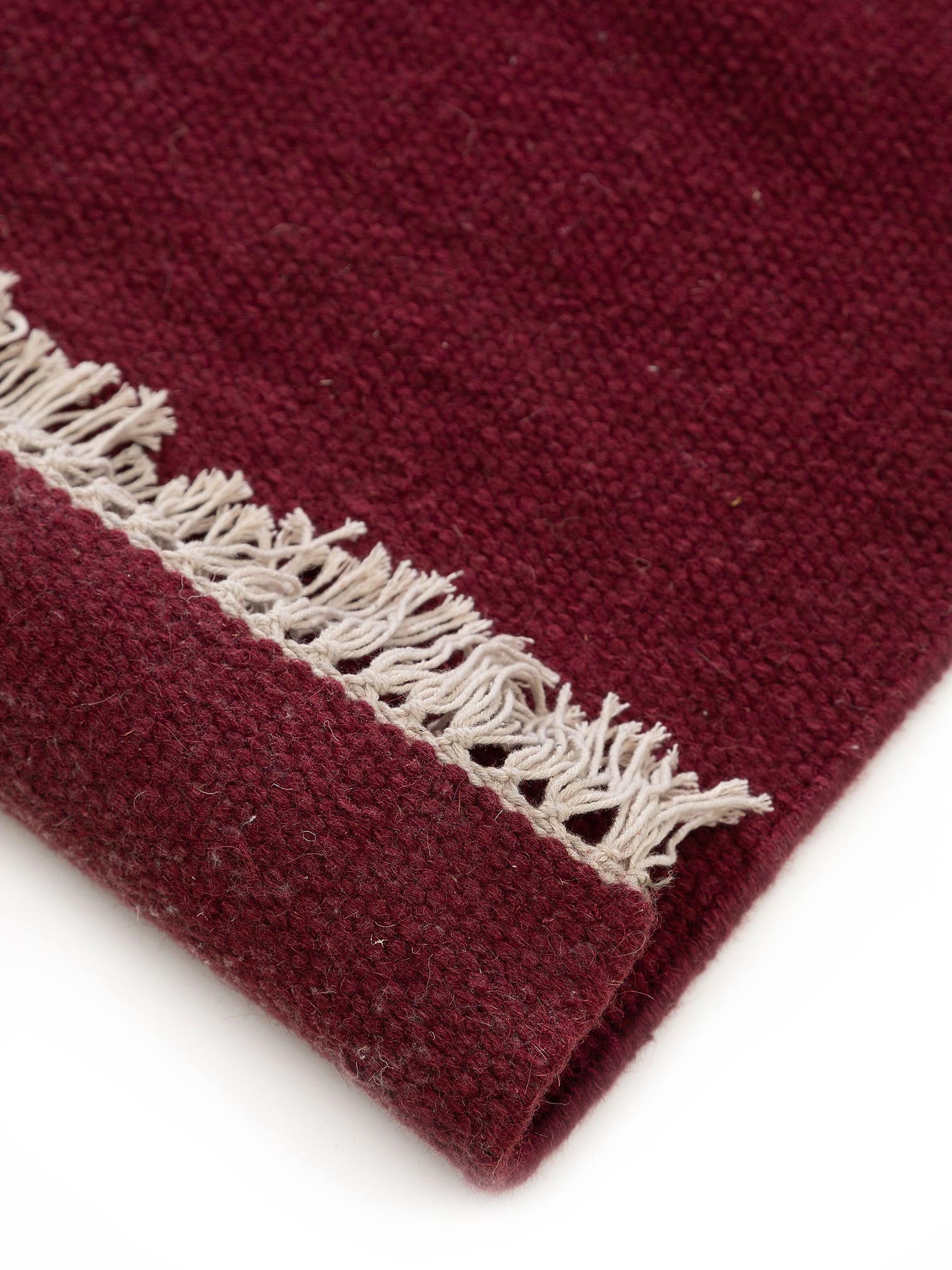 Teppich aus 80% Wolle, 20% Baumwolle in Rot mit bis 5 mm hohem Flor von benuta Pop