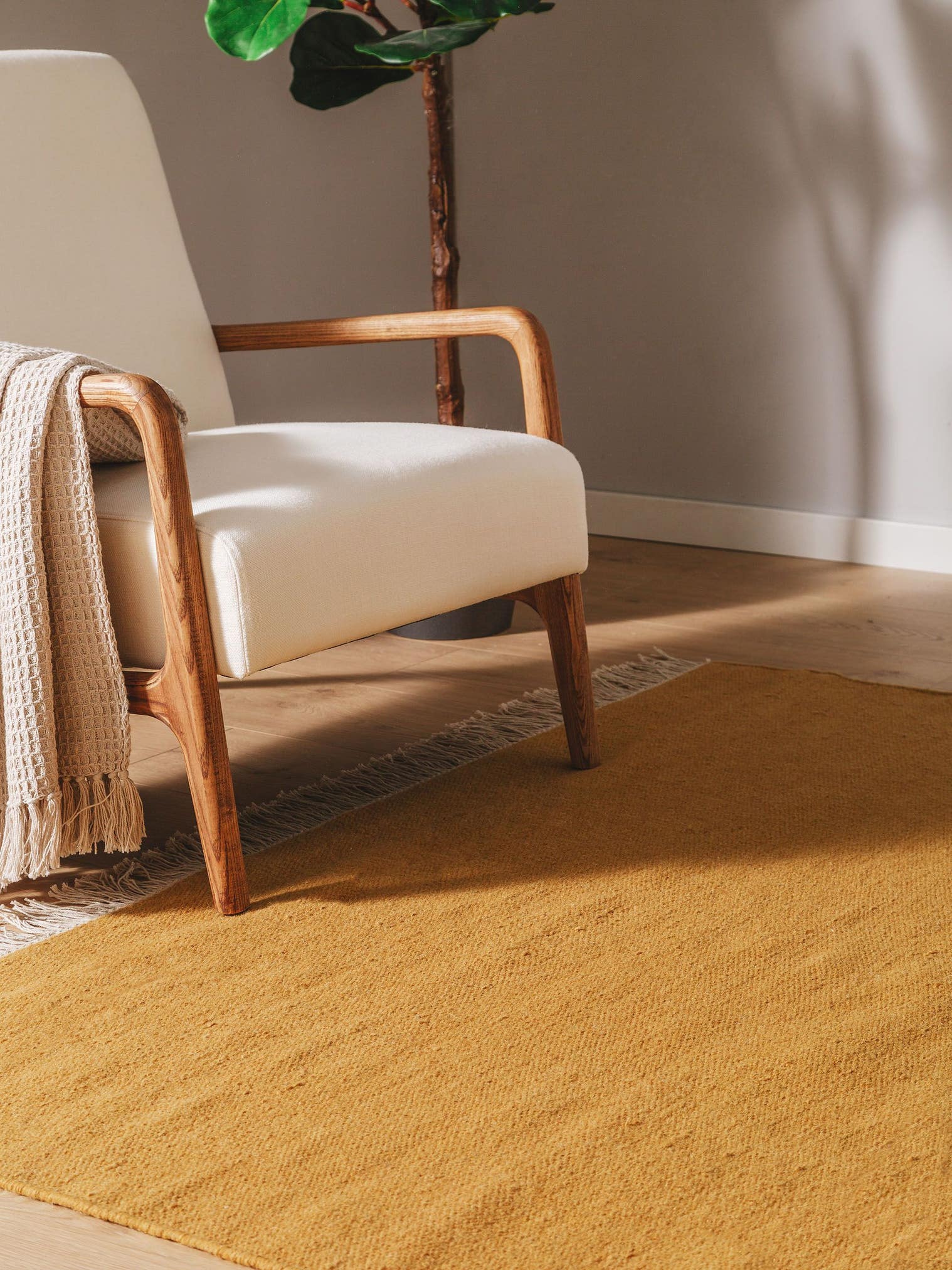Rug made of 80% wool, 20% cotton in Yellow with a 1- 5 mm high pile by benuta Pop