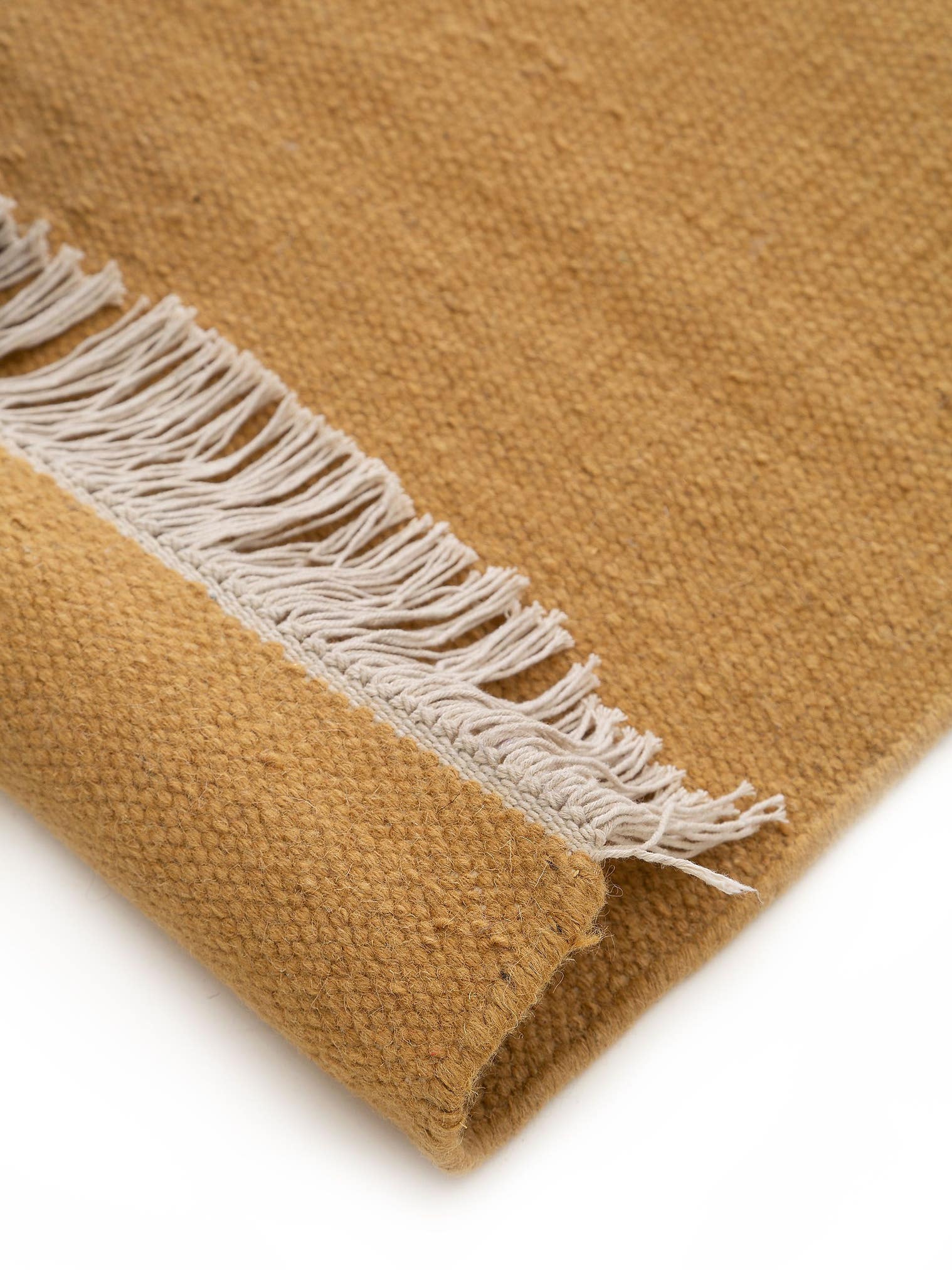 Rug made of 80% wool, 20% cotton in Yellow with a 1- 5 mm high pile by benuta Pop