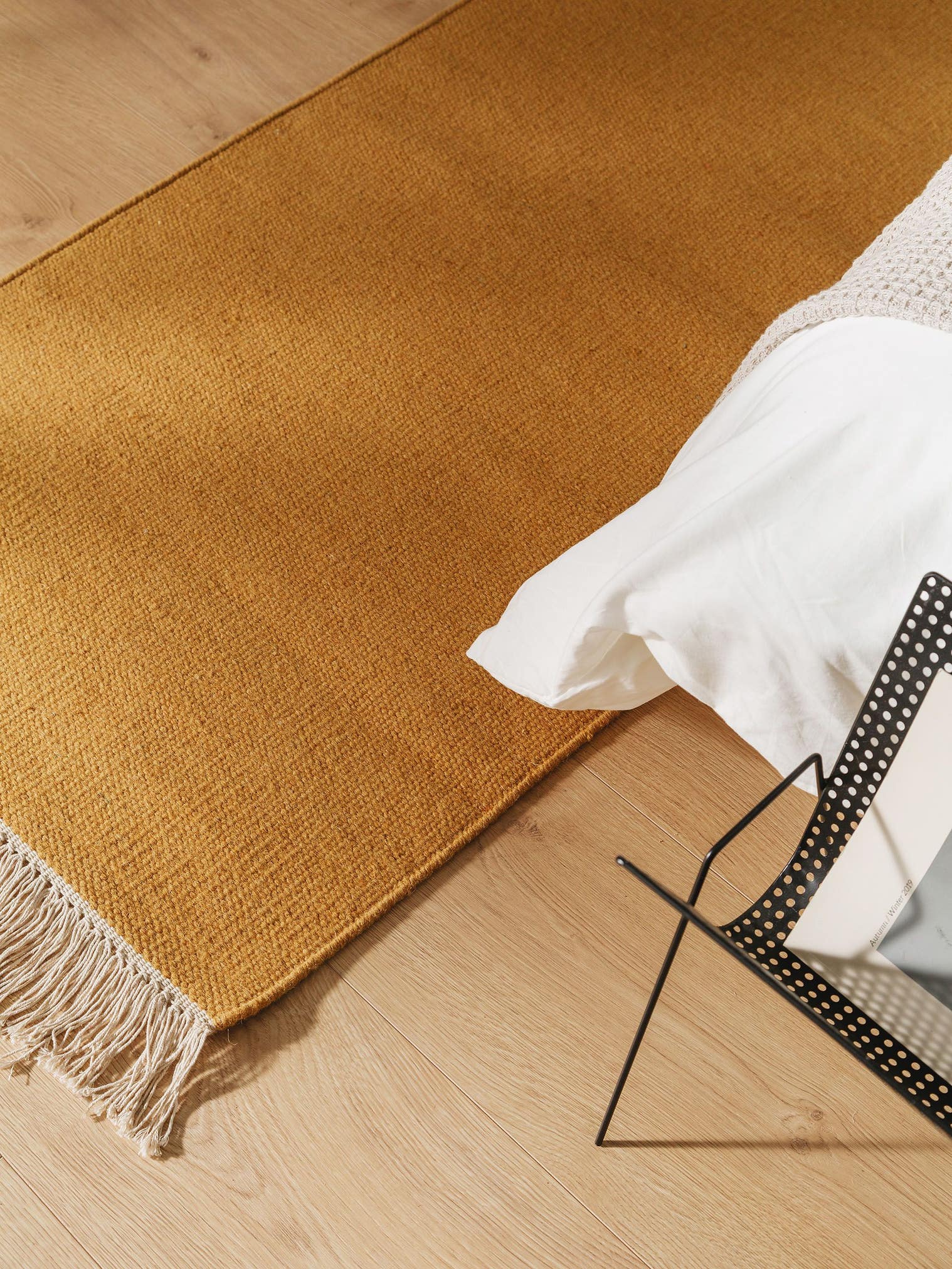 Rug made of 80% wool, 20% cotton in Yellow with a 1- 5 mm high pile by benuta Pop