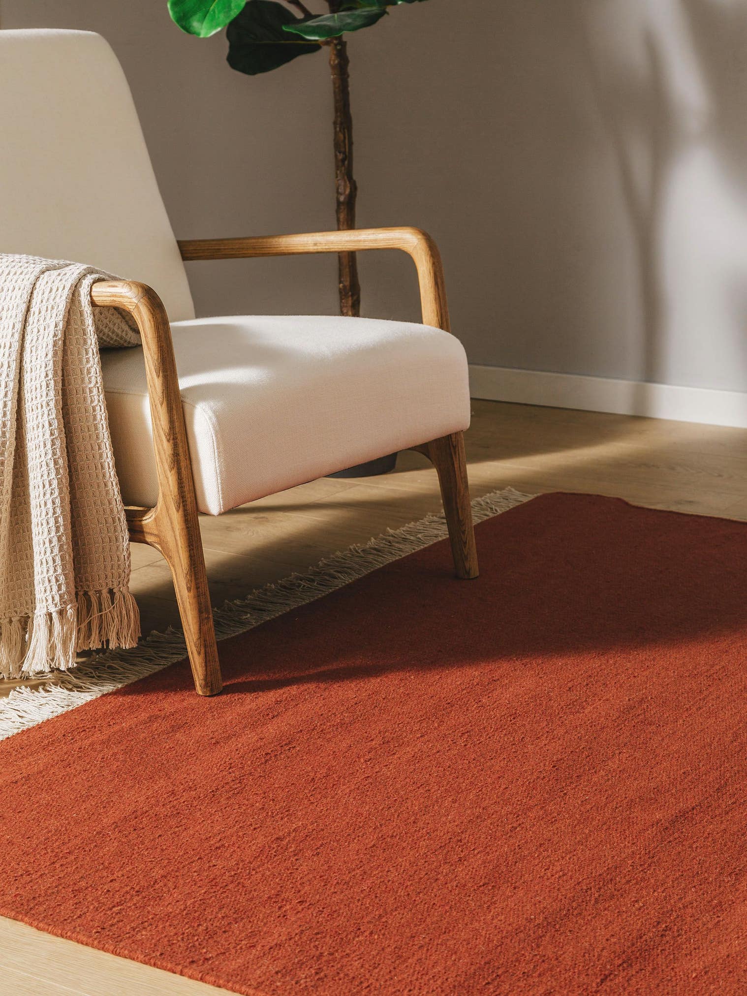 Rug made of 80% wool, 20% cotton in Orange with a 1- 5 mm high pile by benuta Pop