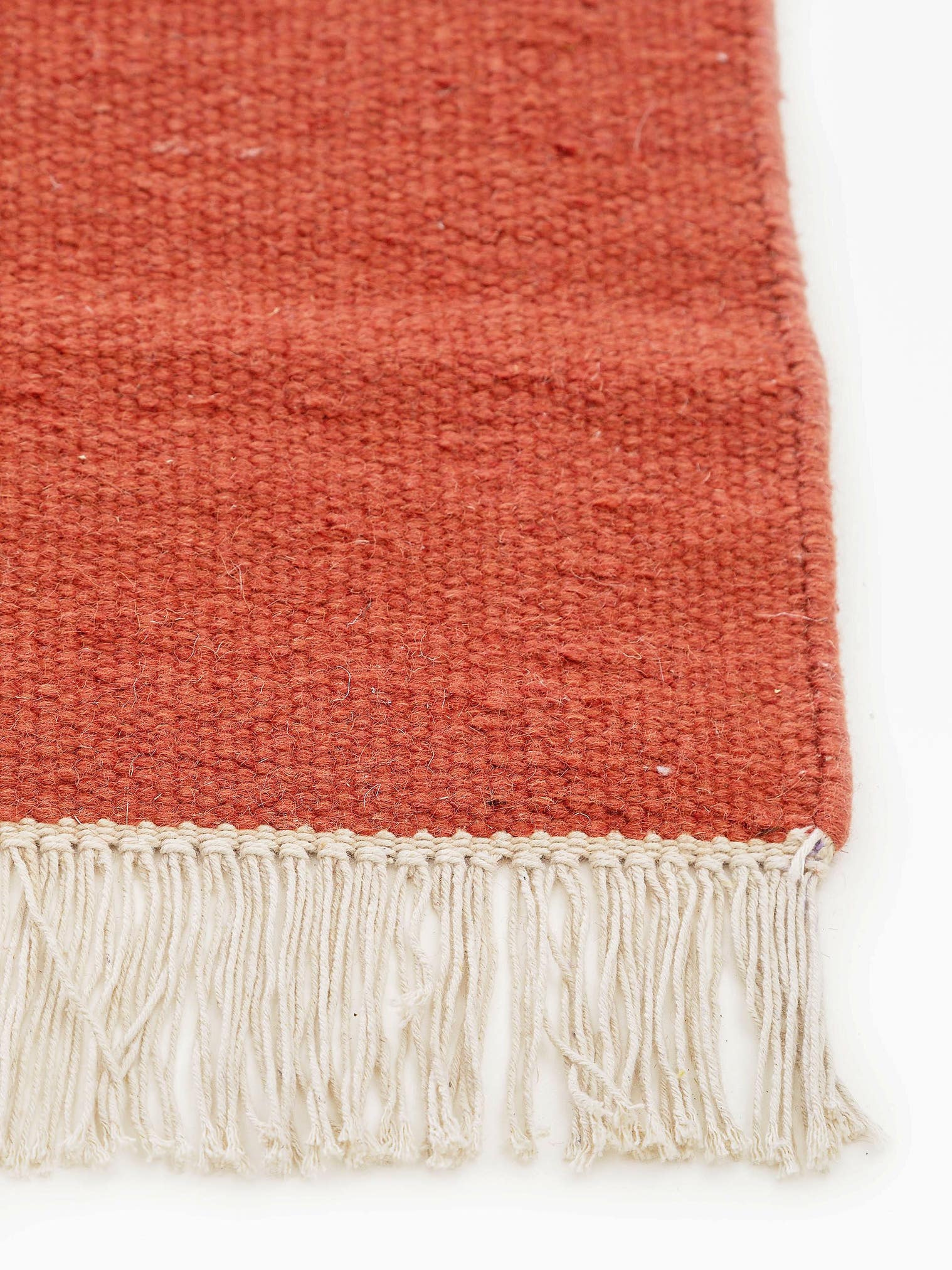 Rug made of 80% wool, 20% cotton in Orange with a 1- 5 mm high pile by benuta Pop