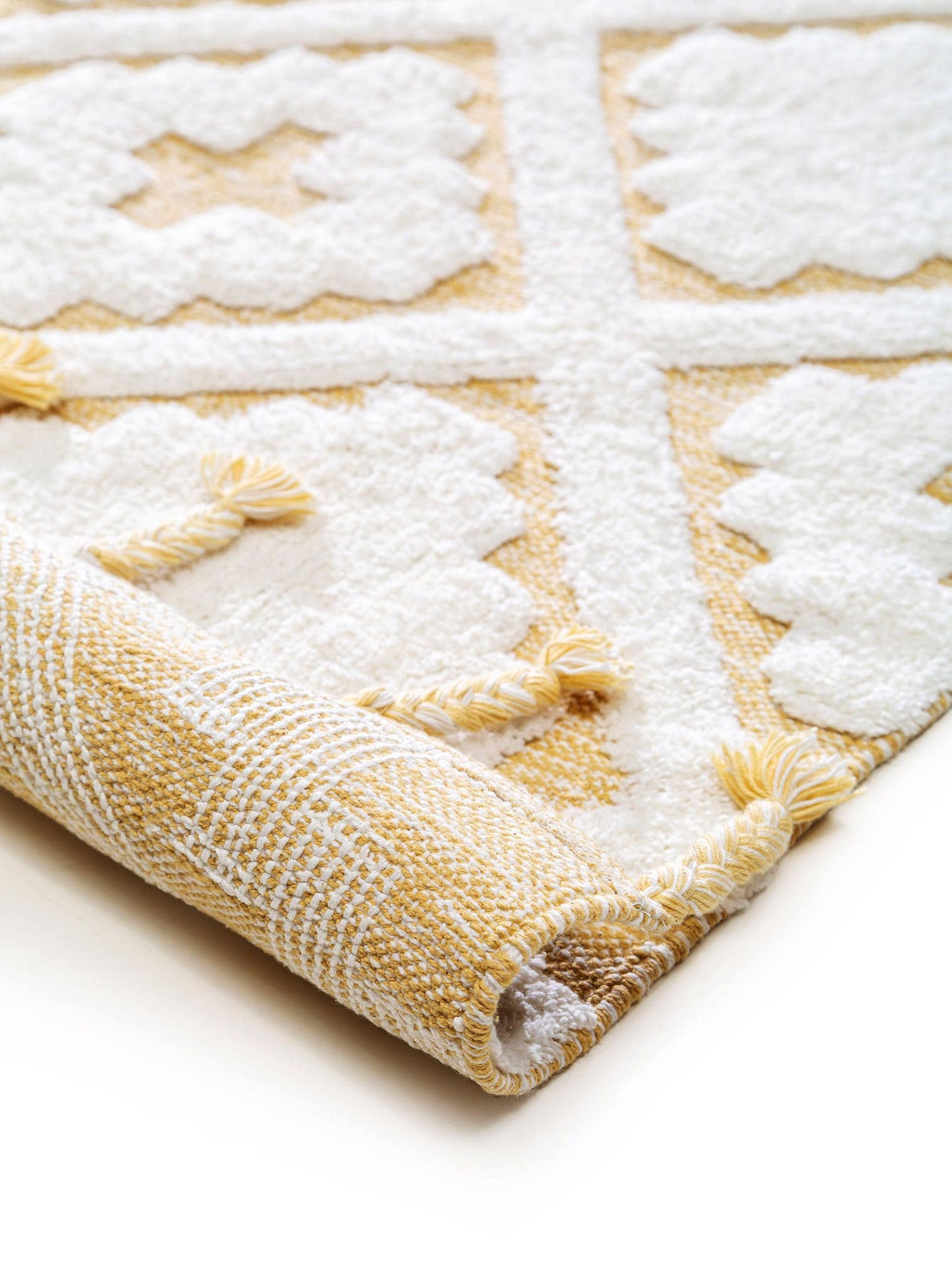 Teppich aus 100% Baumwolle in Gelb mit 6 bis 10 mm hohem Flor von Lytte