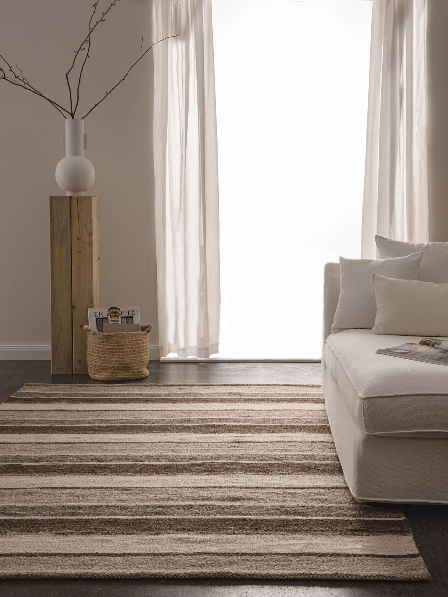 Teppich aus 80% Wolle, 20% Baumwolle in Braun mit bis 5 mm hohem Flor von benuta Pure