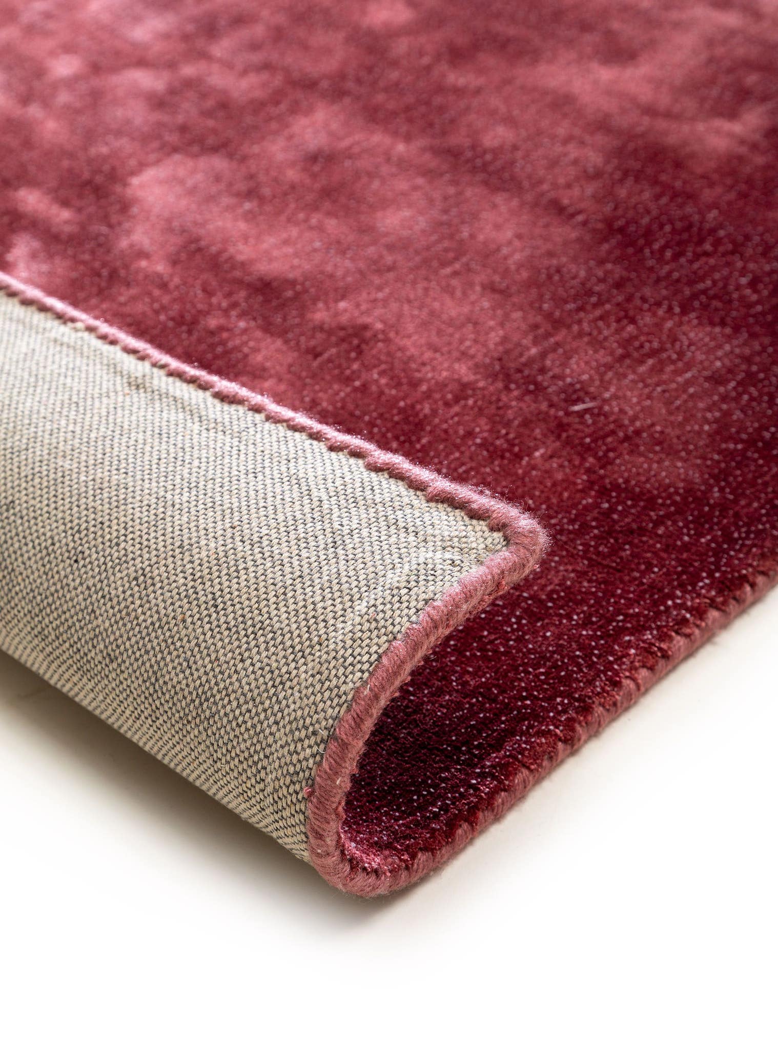 Rug made of 97% Viscose, 3% Polyester in Red with a 6 - 10 mm high pile by benuta Finest