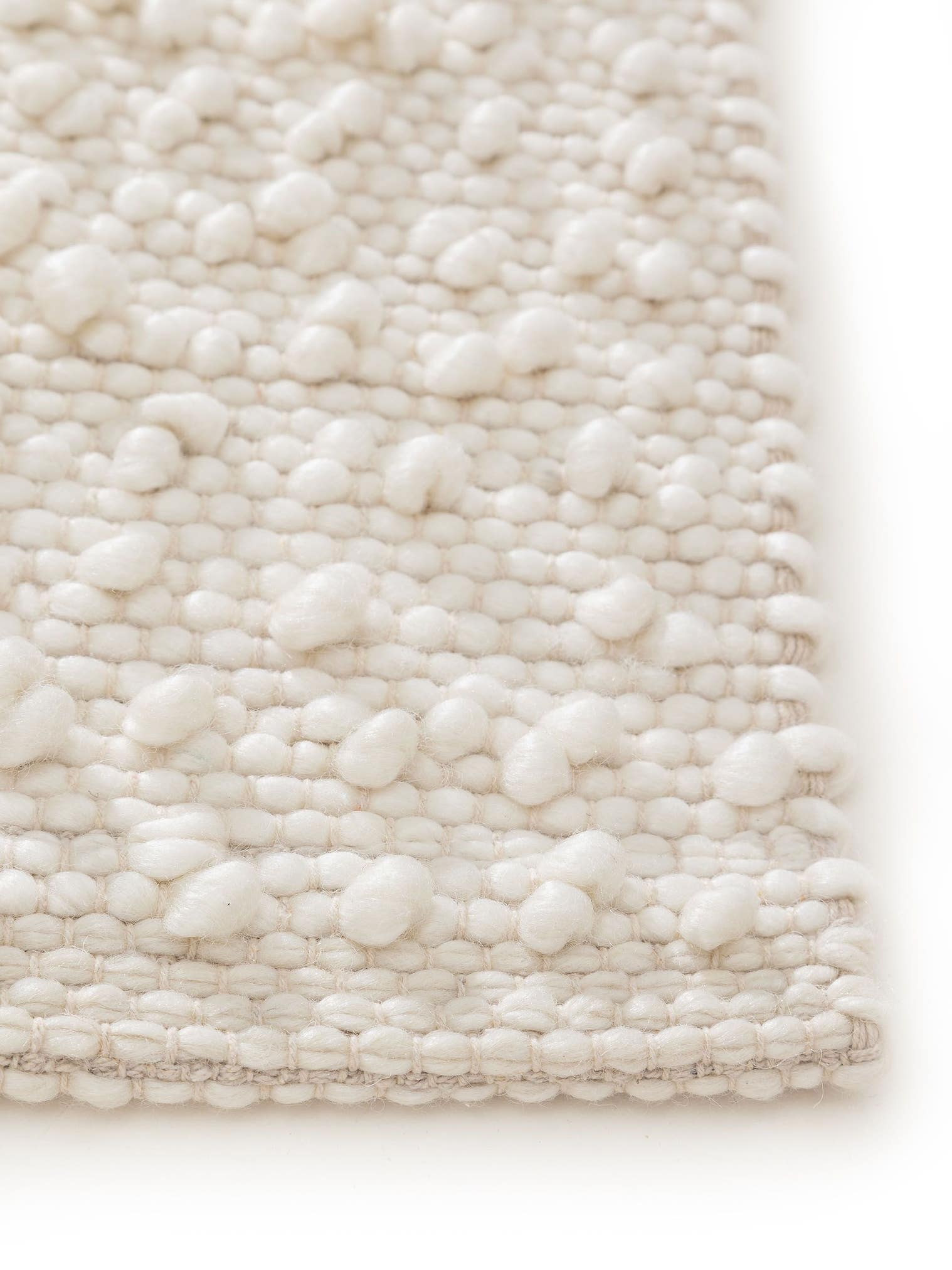 Teppich aus 70% Wolle, 20% Baumwolle, 10% Viskose in Beige mit bis 5 mm hohem Flor von benuta Pure