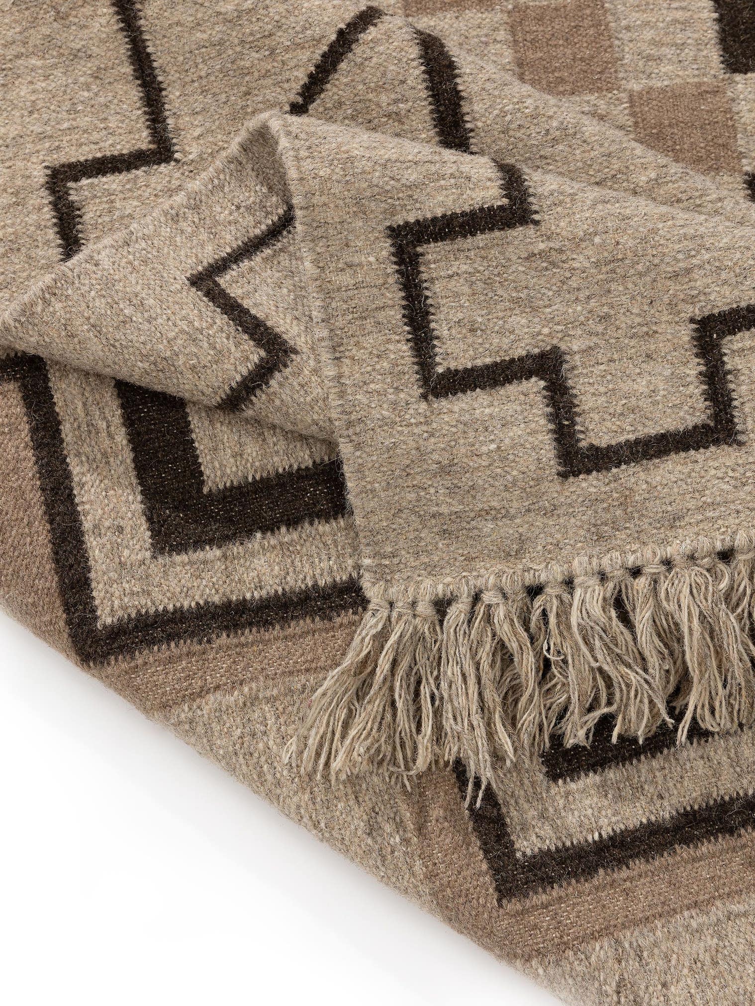 Teppich aus 80% Wolle, 20% Baumwolle in Taupe mit bis 5 mm hohem Flor von benuta Pure