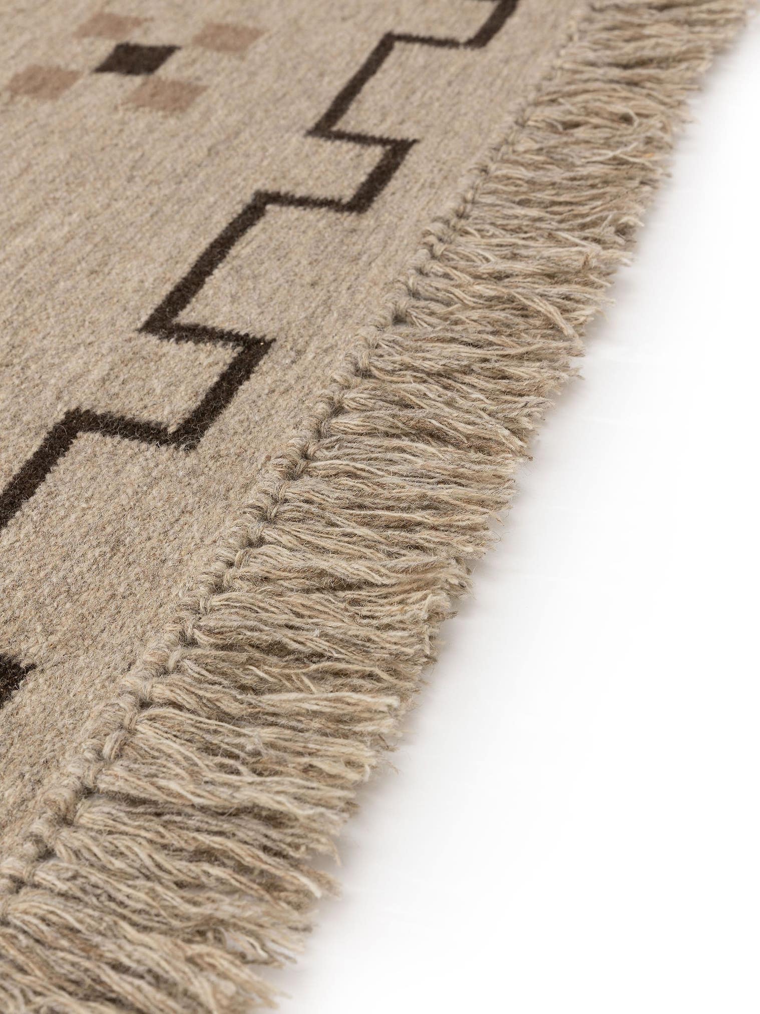 Teppich aus 80% Wolle, 20% Baumwolle in Taupe mit bis 5 mm hohem Flor von benuta Pure