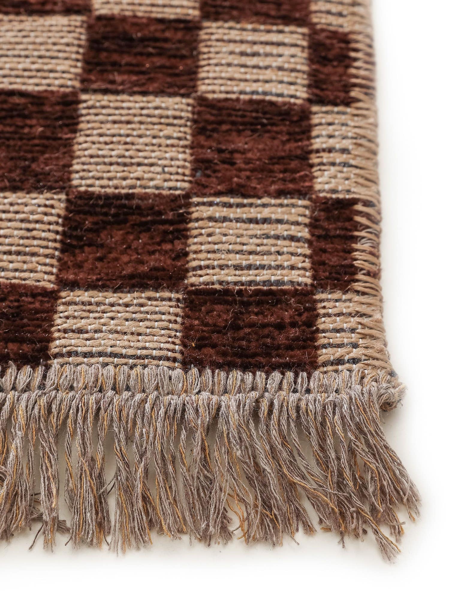 Teppich aus 55% Baumwolle (recycelt), 30% Jute, 15% Polyester in Braun mit bis 5 mm hohem Flor von benuta Pure