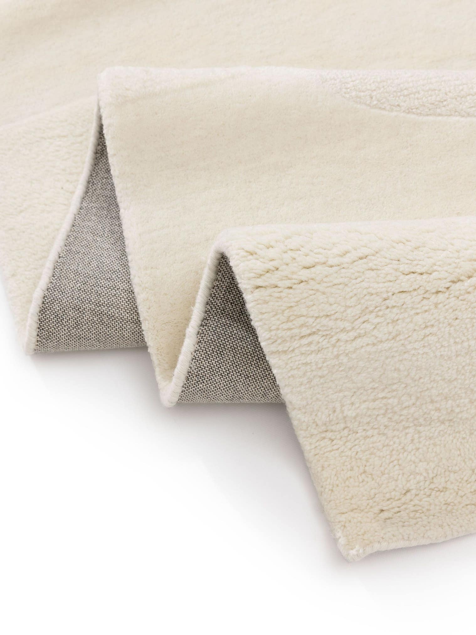 Teppich aus 100% Wolle in Weiß mit 11 bis 20 mm hohem Flor von Brink & Campman
