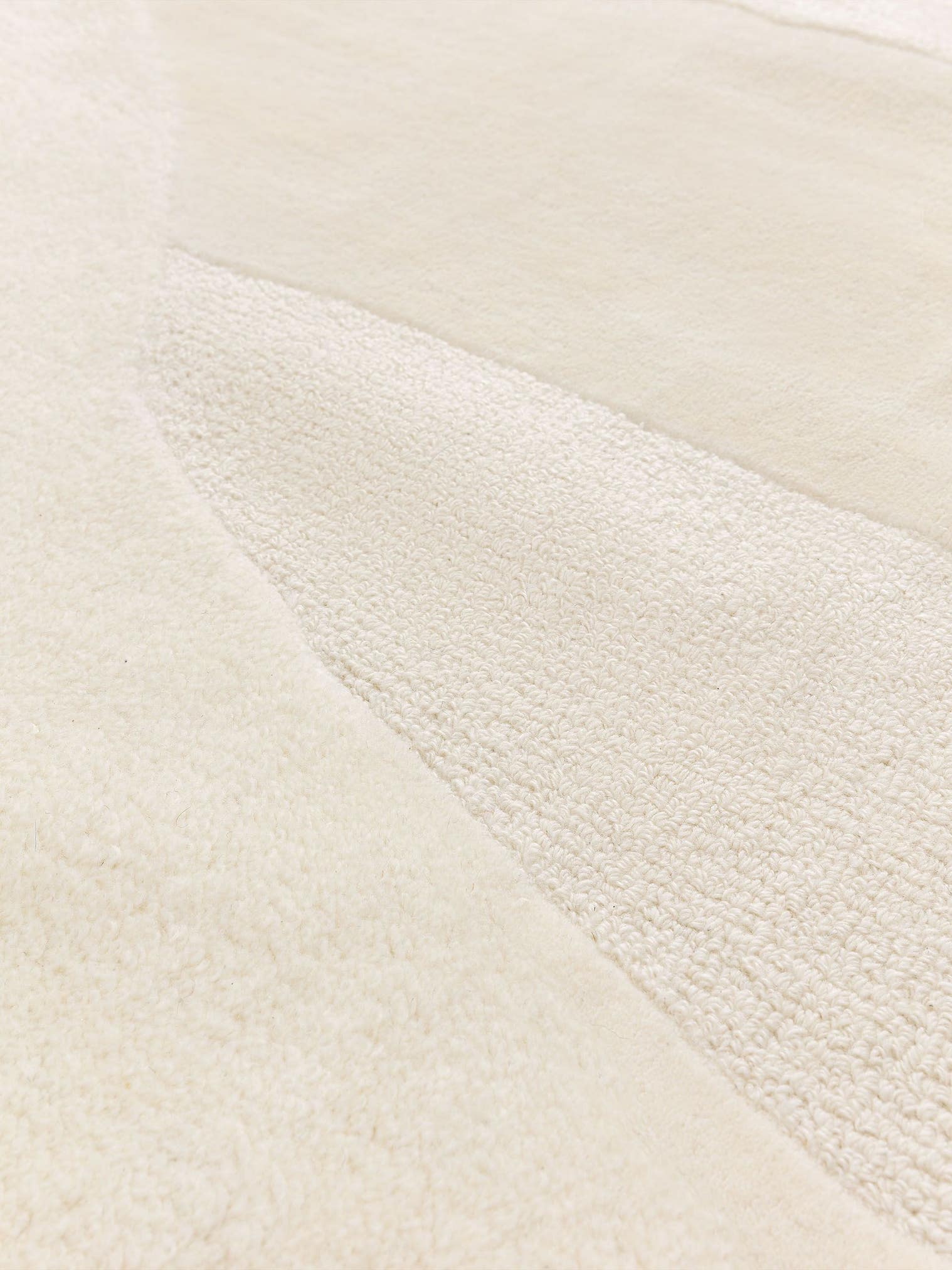 Teppich aus 100% Wolle in Weiß mit 11 bis 20 mm hohem Flor von Brink & Campman