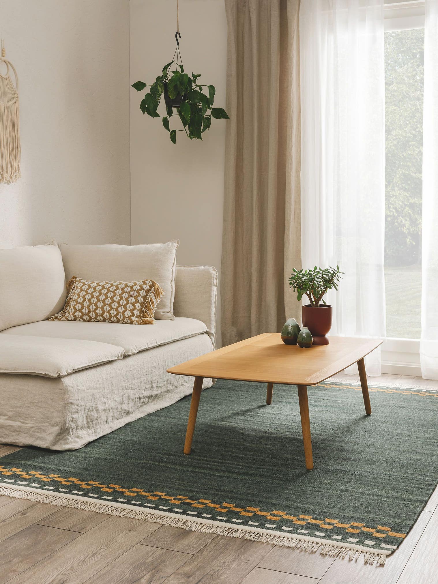 Teppich aus 80% Wolle, 20% Baumwolle in Grün mit bis 5 mm hohem Flor von benuta Pure