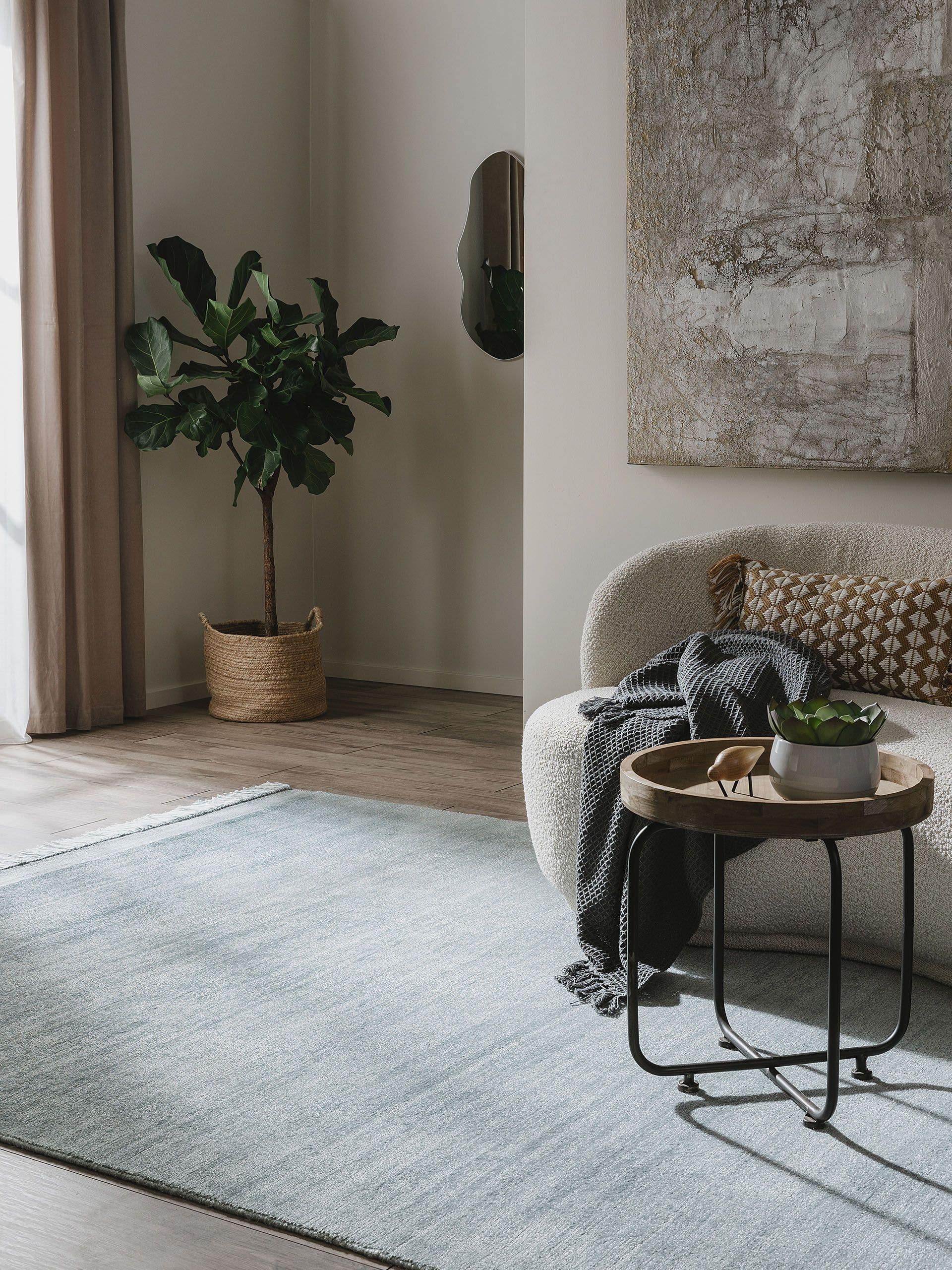 Rug made of 80% Polyester, 20% Cotton in Turquoise with a 6 - 10 mm high pile by benuta Pure