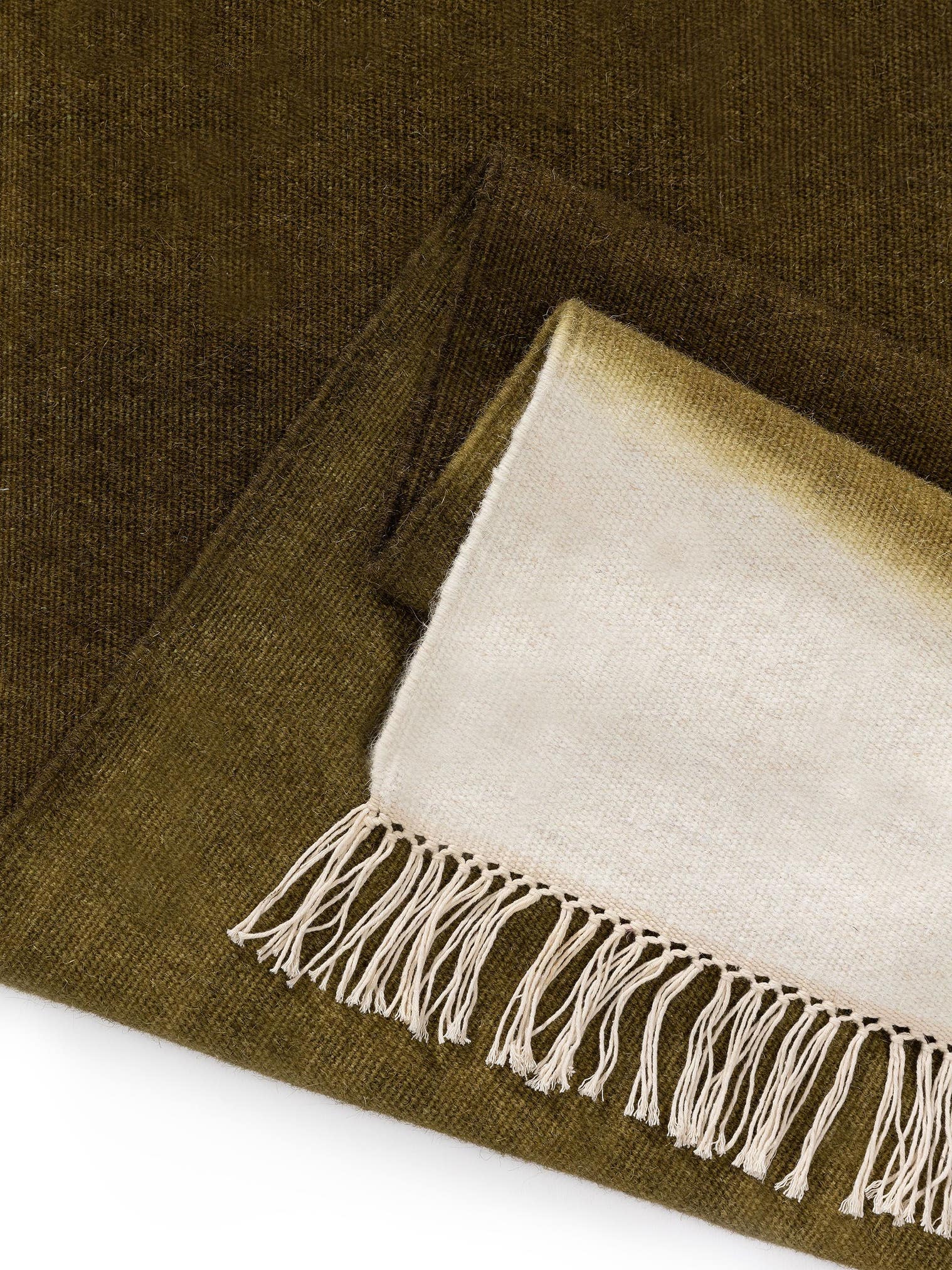 Teppich aus 80% Wolle, 20% Baumwolle in Grün mit bis 5 mm hohem Flor von benuta Pop