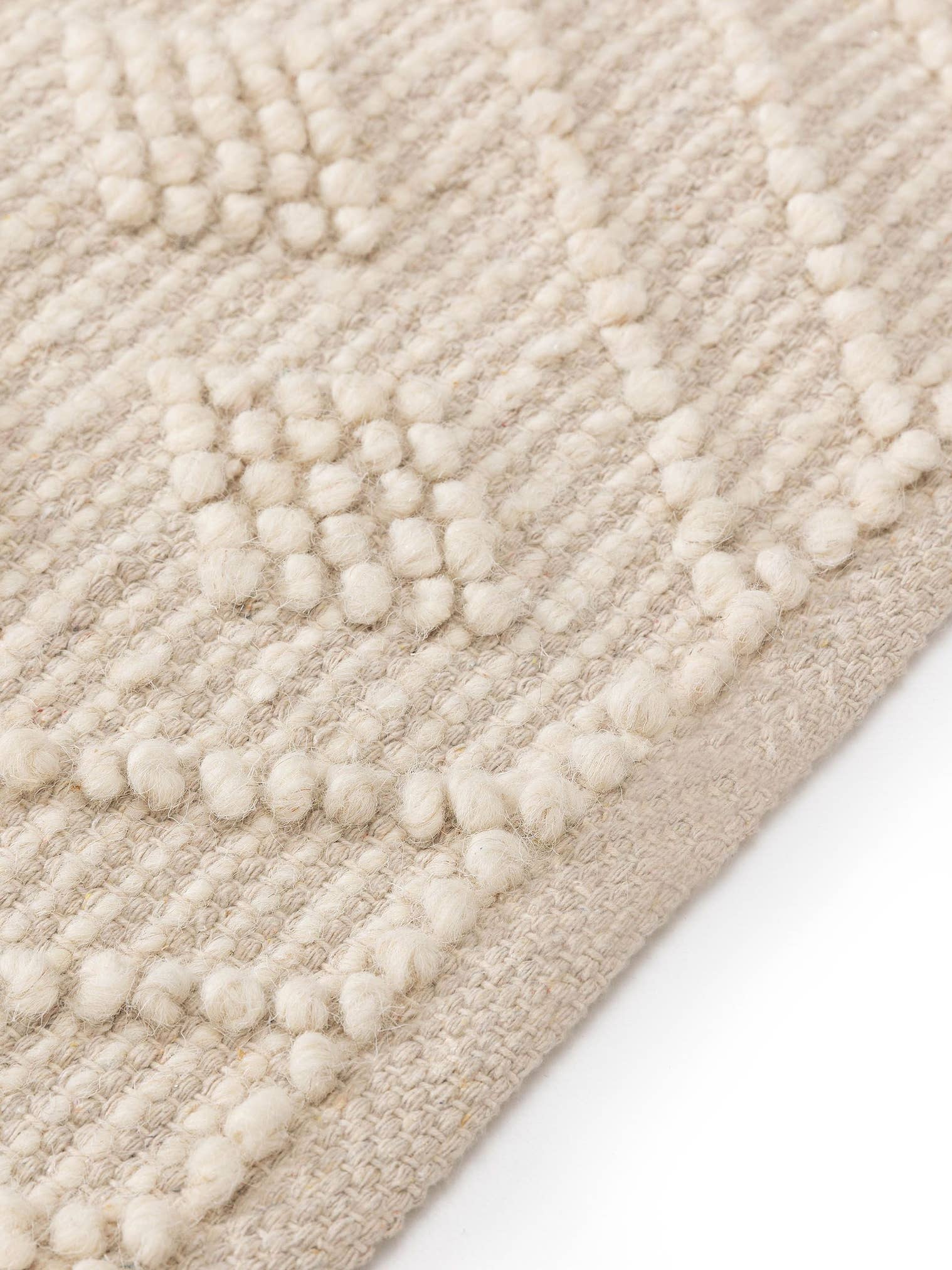 Teppich aus 60% Wolle, 40% Baumwolle in Beige mit 11 bis 20 mm hohem Flor von benuta Pure