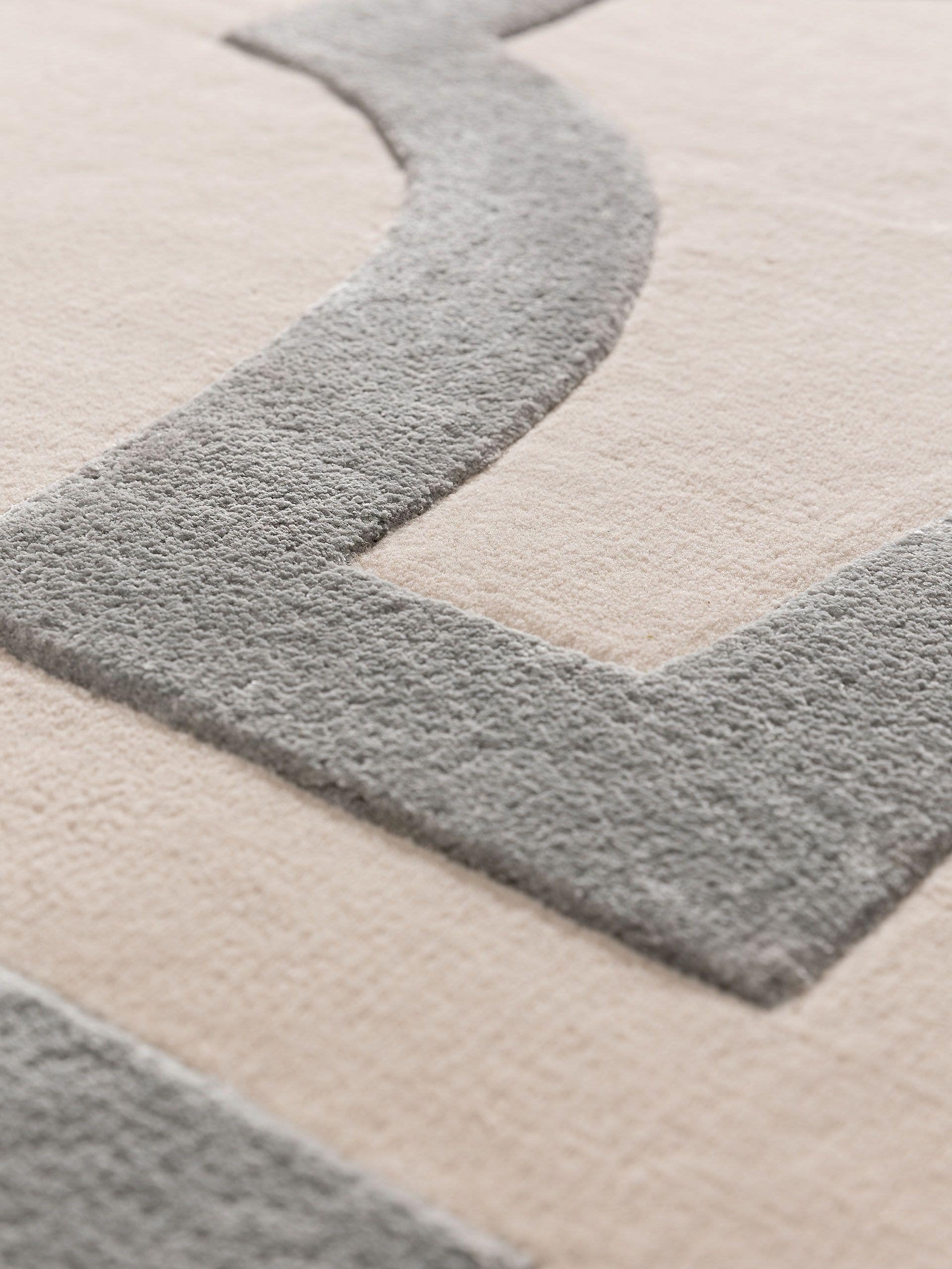 Tapijt van 65% Wol, 35% Lyocell (TENCEL™) in Beige met een 6 - 10 mm hoge pool van benuta Finest