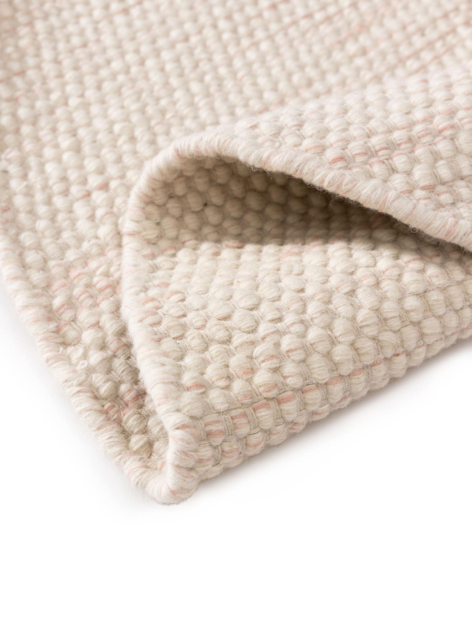 Teppich aus 100% Wolle (aus Neuseeland) in Rosa mit bis 5 mm hohem Flor von Lytte