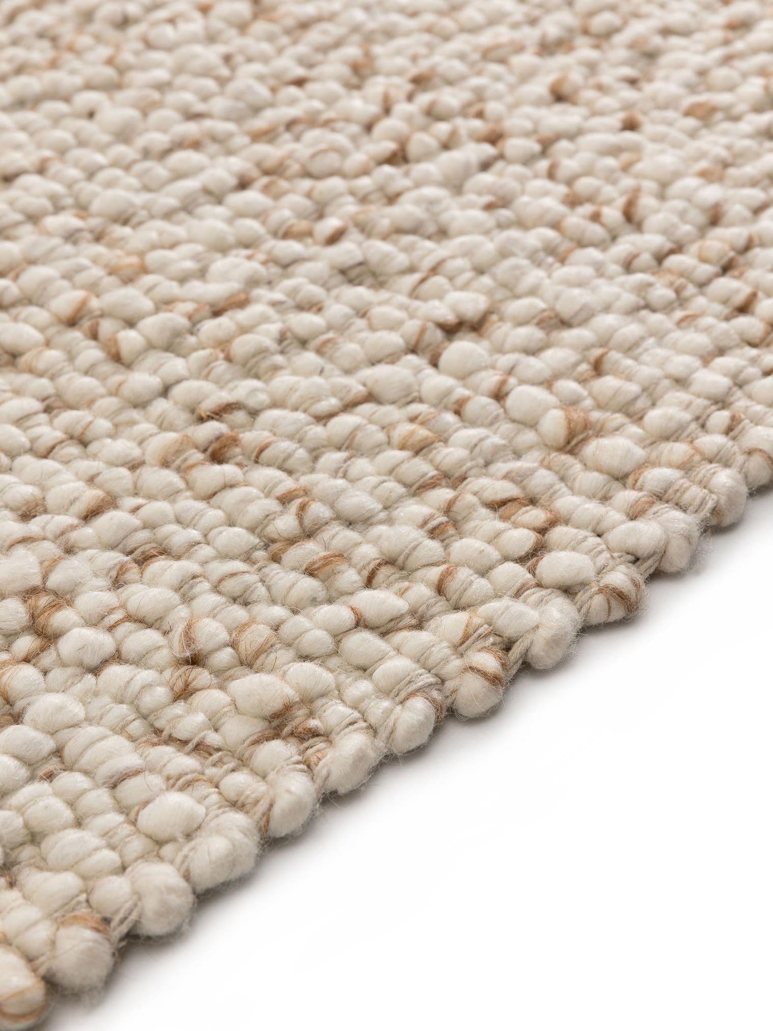 Teppich aus 70% Wolle, 15% Jute, 15% Baumwolle in Braun mit 11 bis 20 mm hohem Flor von benuta Pure
