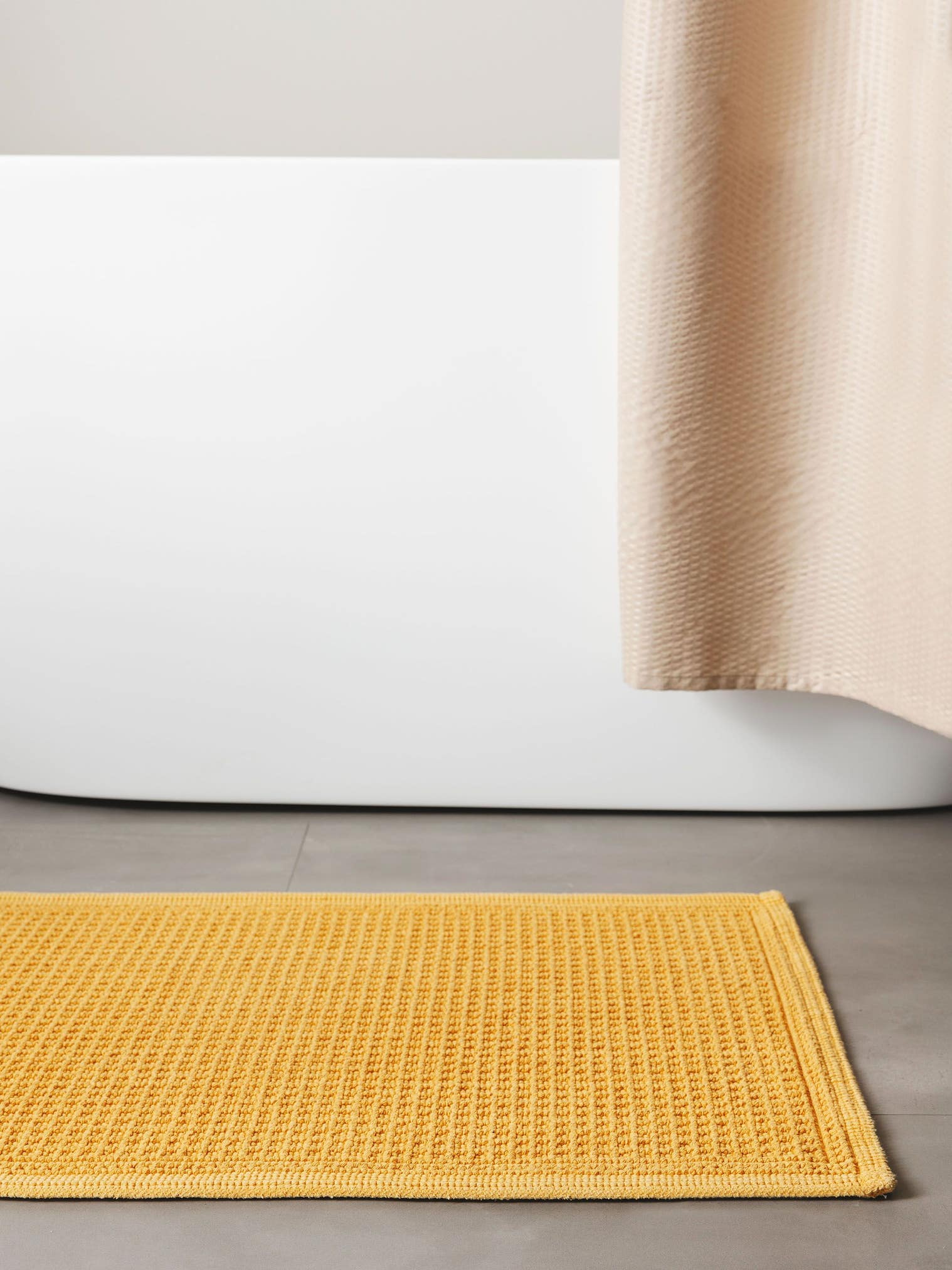 Teppich aus 100% Baumwolle in Gelb mit bis 5 mm hohem Flor von benuta Nest