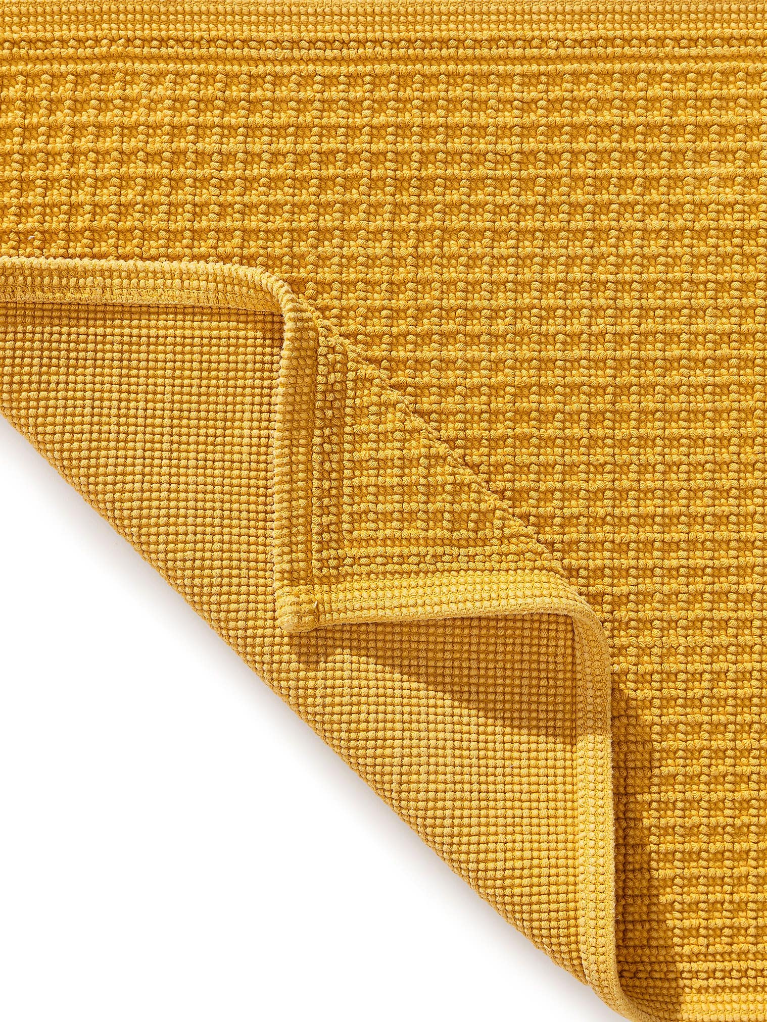 Teppich aus 100% Baumwolle in Gelb mit bis 5 mm hohem Flor von benuta Nest