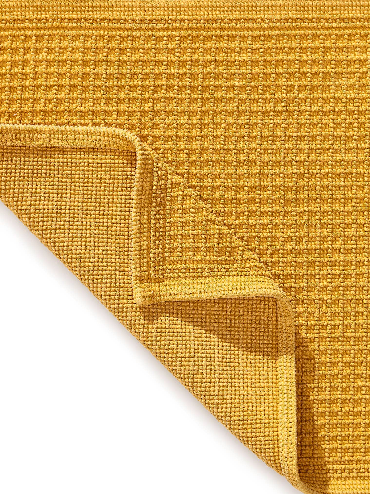 Rug made of 100% Cotton in Yellow with a 1- 5 mm high pile by benuta Nest