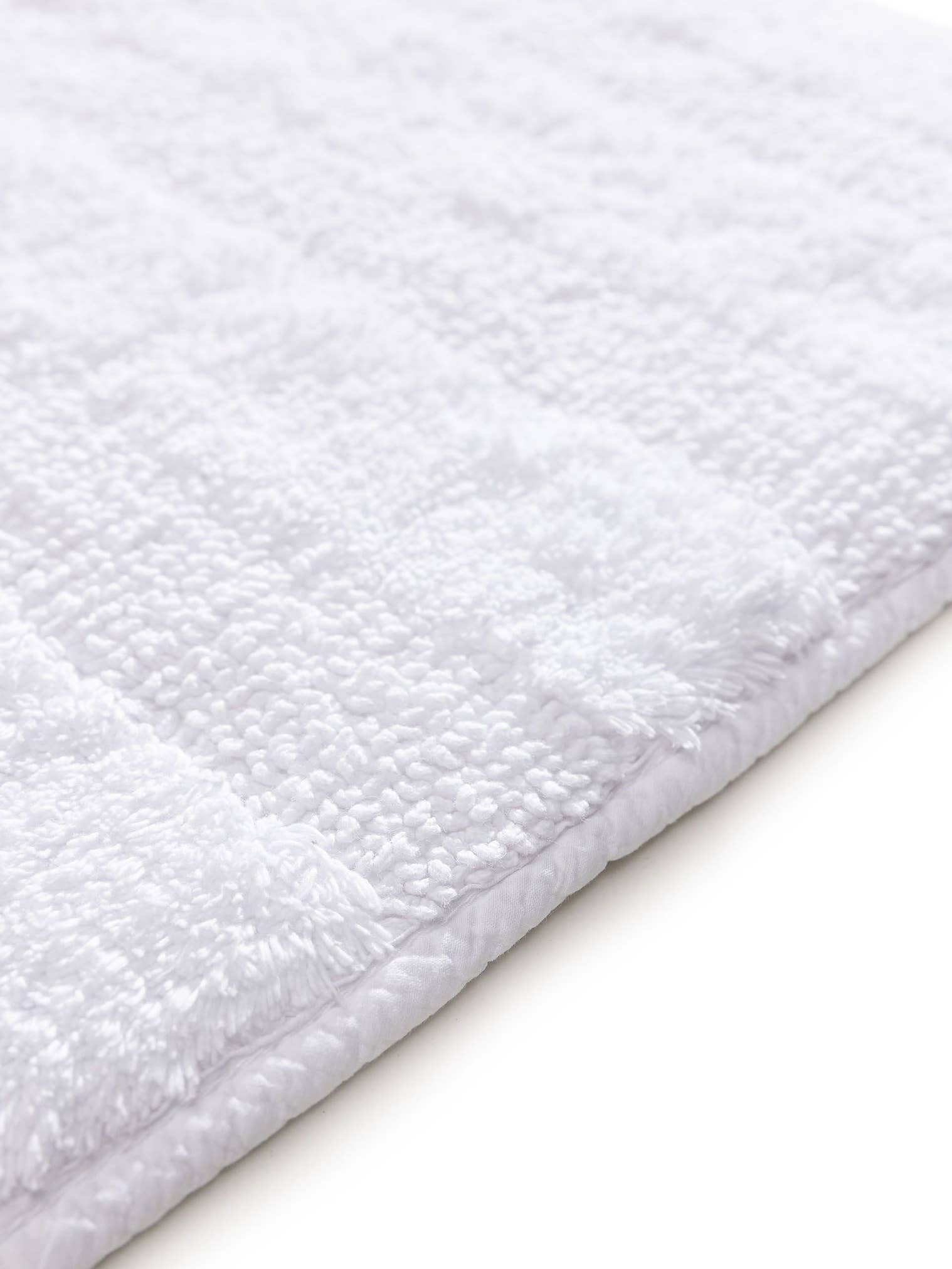 Teppich aus 100% Baumwolle in Weiß mit bis 5 mm hohem Flor von benuta Nest
