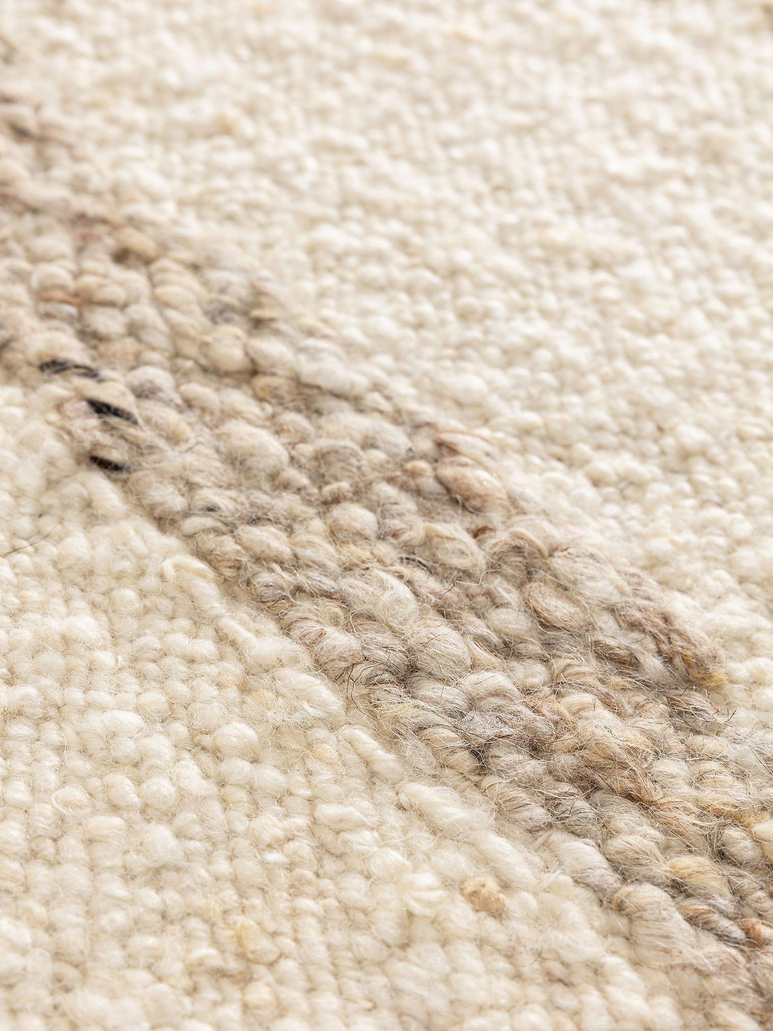 Teppich aus 90% Wolle, 10% Baumwolle in Beige mit 11 bis 20 mm hohem Flor von benuta Pure