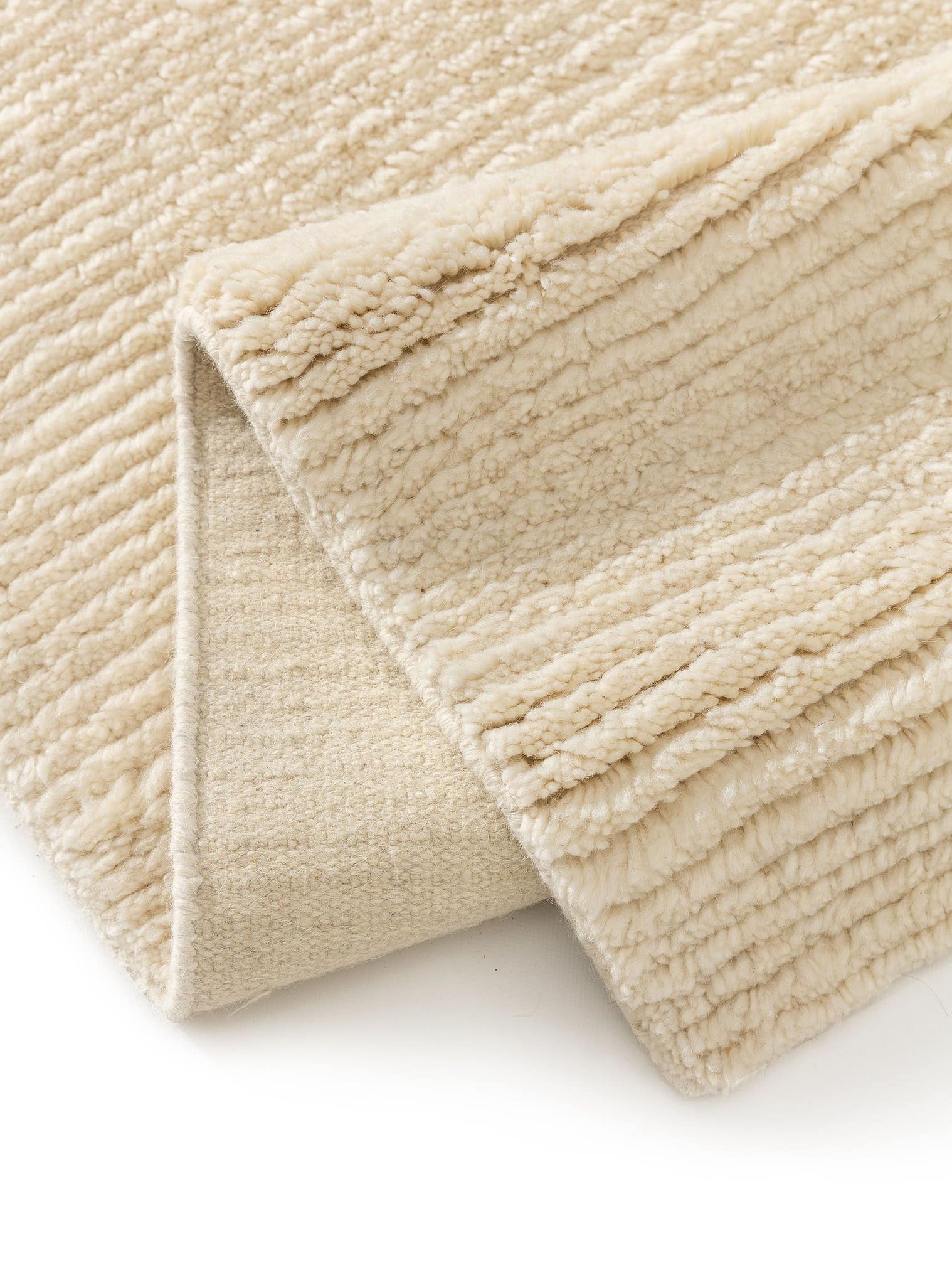 Rug made of 90% Wool, 10% Cotton in Beige with a 21 - 30 mm high pile by benuta Finest