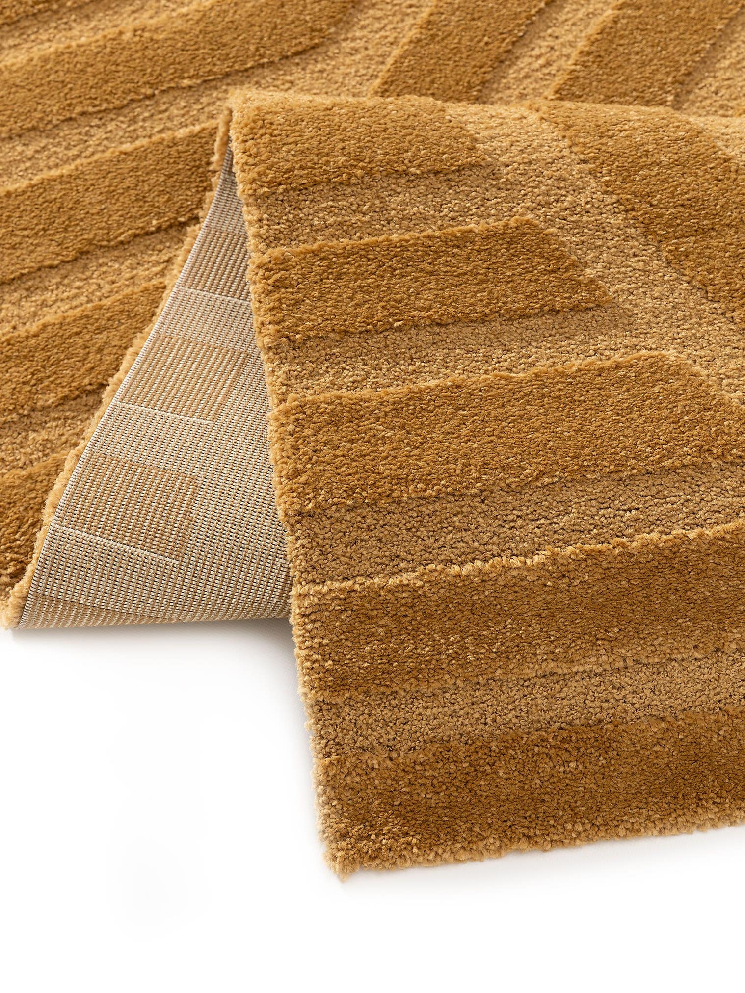 Teppich aus 60% Polypropylen, 40% Polyester in Gelb mit 11 bis 20 mm hohem Flor von benuta Nest