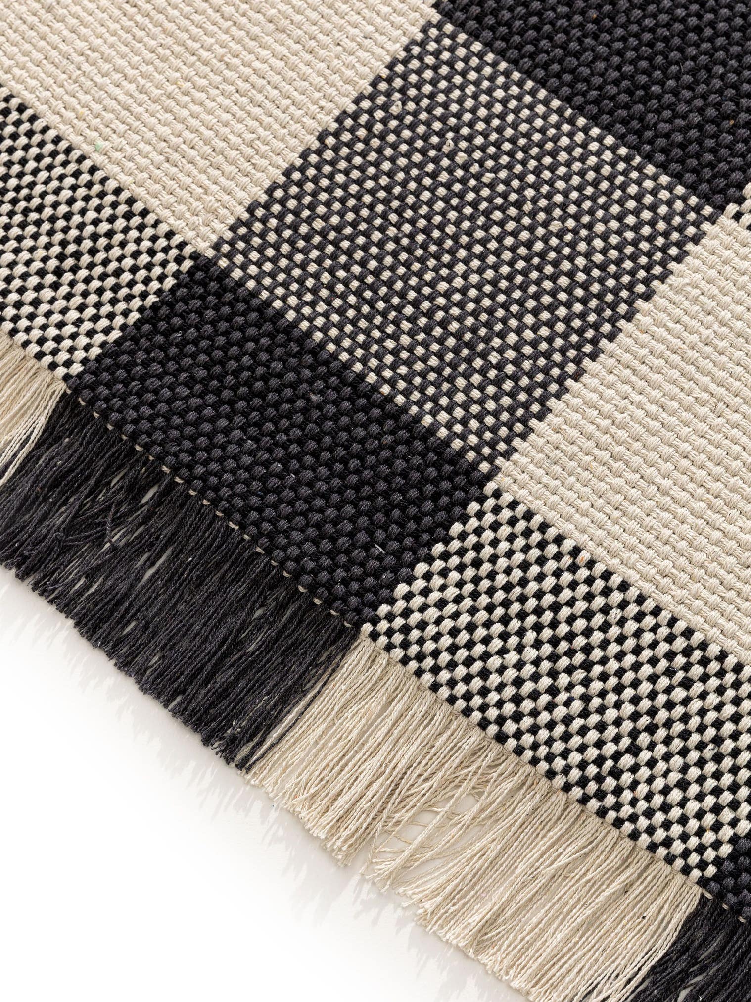 Teppich aus 100% Baumwolle in Schwarz/Weiß mit bis 5 mm hohem Flor von benuta Pop
