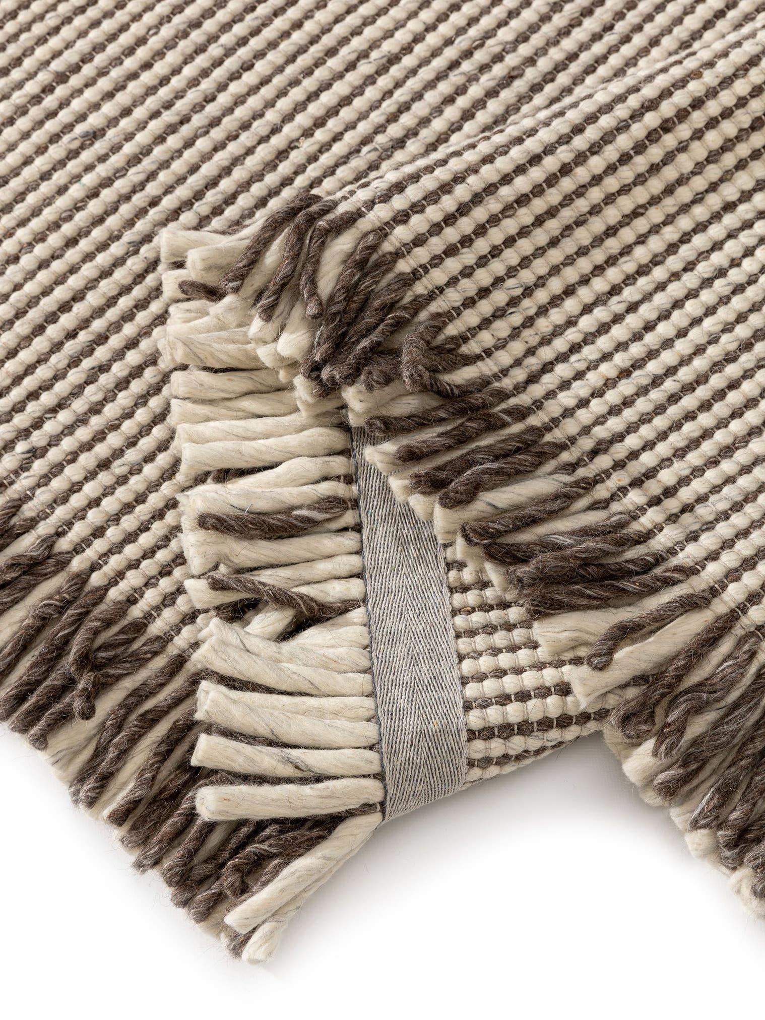 Teppich aus 60% Wolle, 25% Polyester, 15% Viskose in Beige mit bis 5 mm hohem Flor von benuta Pure