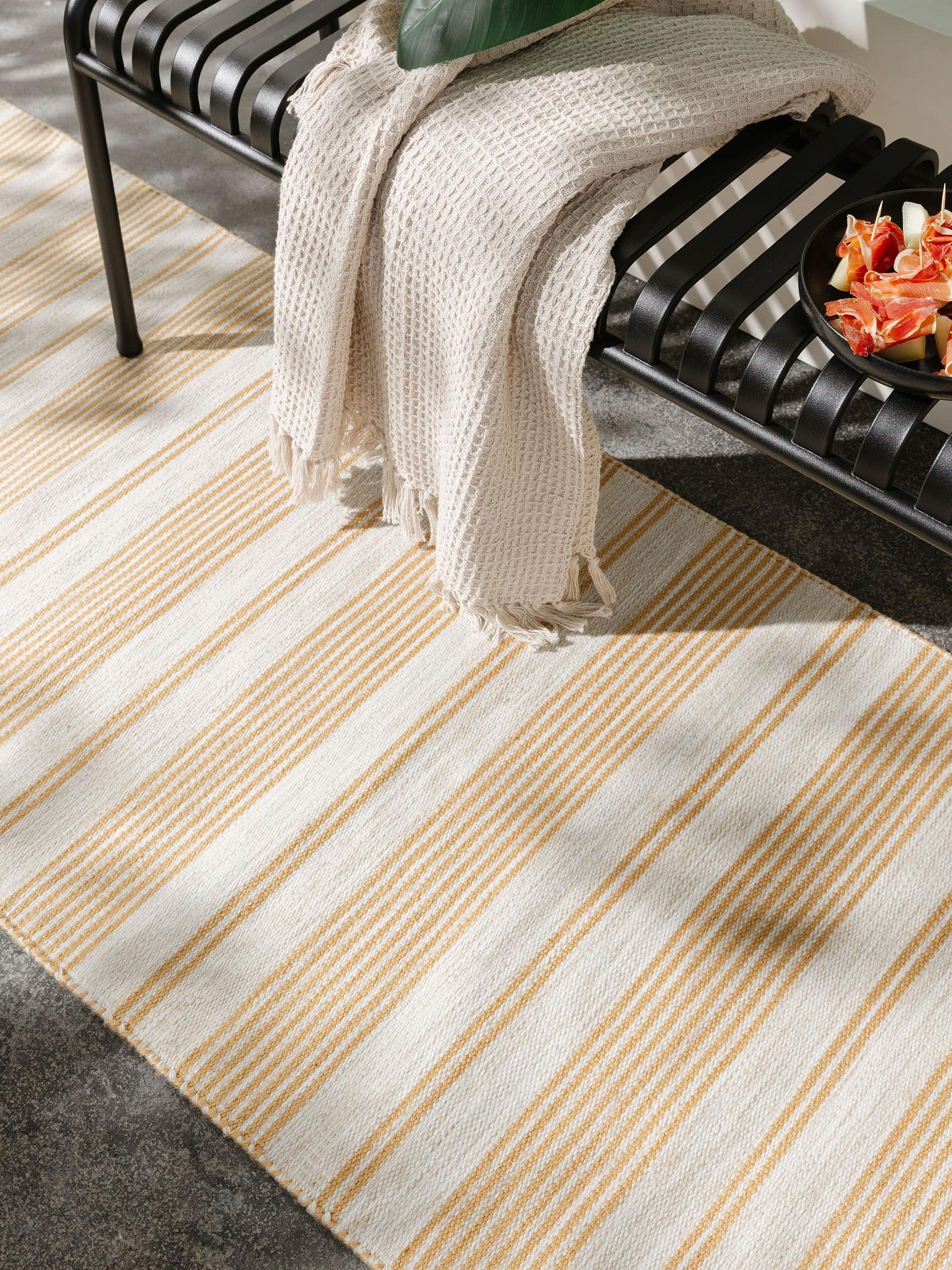 Rug made of 100% Polyester (recycled PET) in Yellow with a 1- 5 mm high pile by benuta Nest
