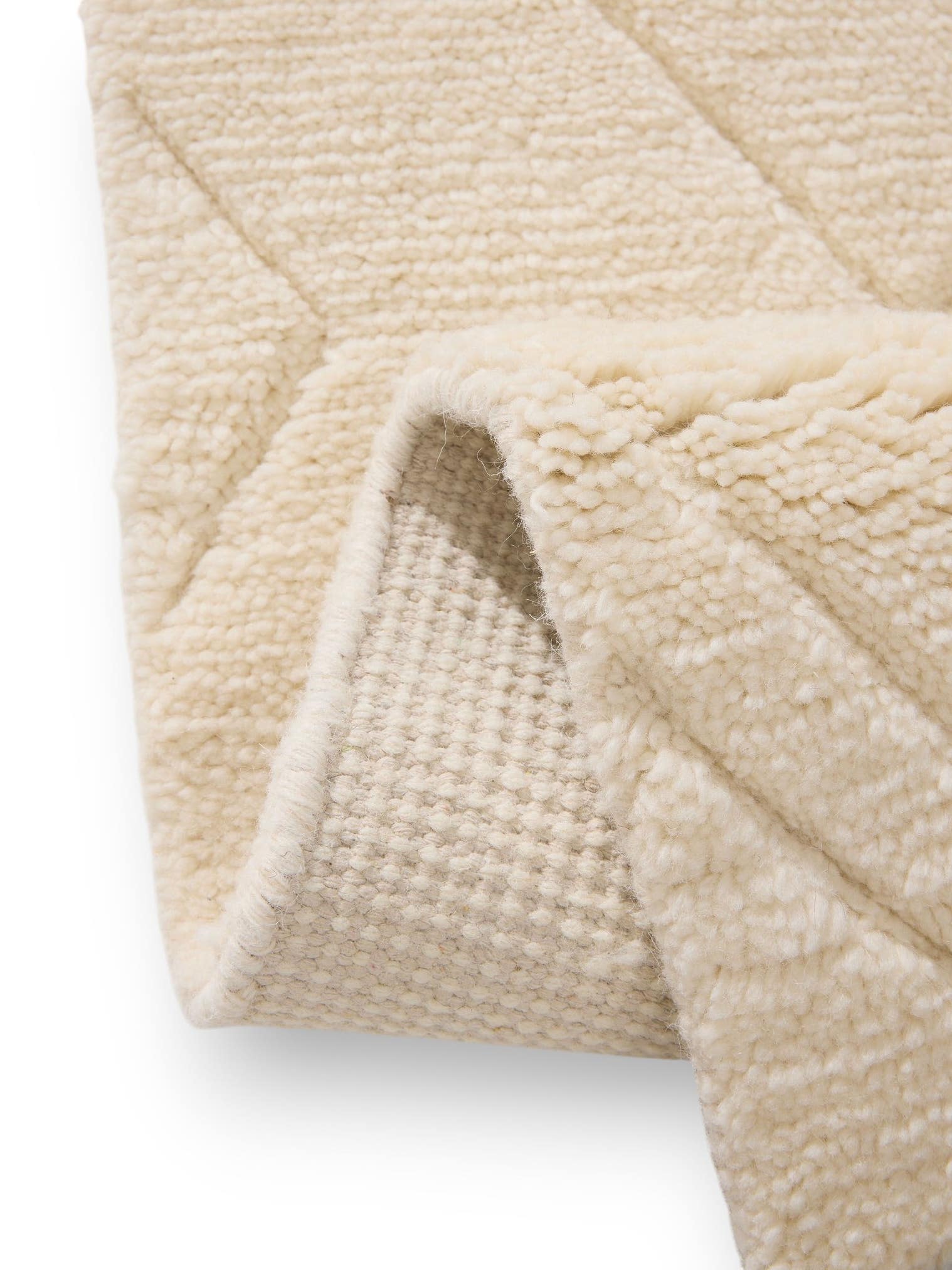Tapijt van 100% Wol in Beige met een 21 - 30 mm hoge pool van benuta Finest
