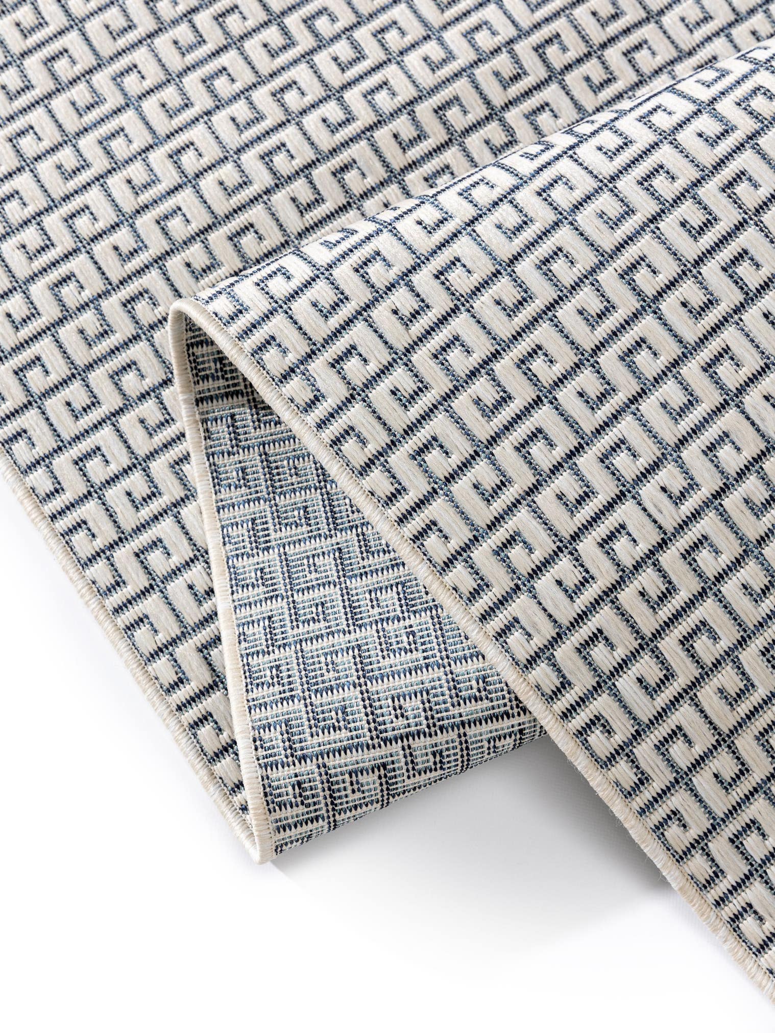Teppich aus 100% Polypropylen in Weiß mit bis 5 mm hohem Flor von benuta Basic