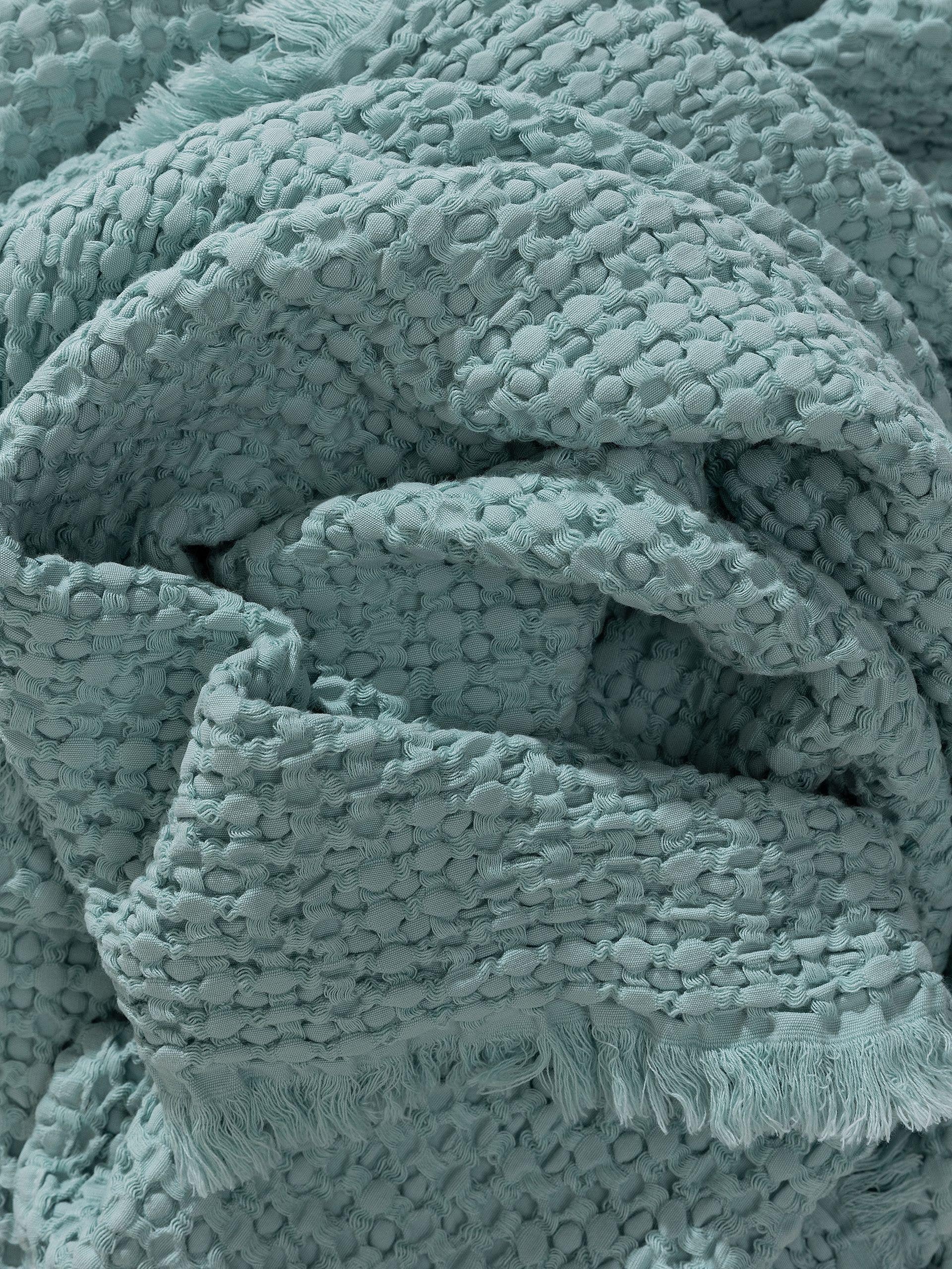 Pläd i bomull Cloe Turkos med Relief-design i 100% Bomull från benuta