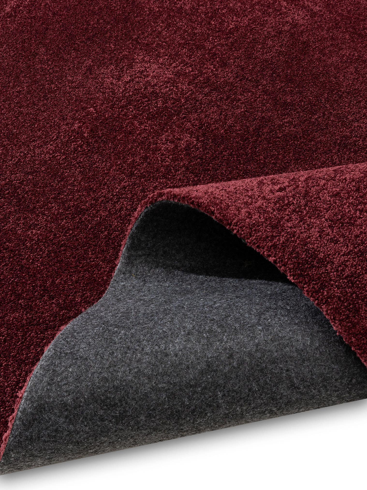 Rug made of 100% polyester (30% recycled) in Red with a 11 - 20 mm high pile by benuta Nest
