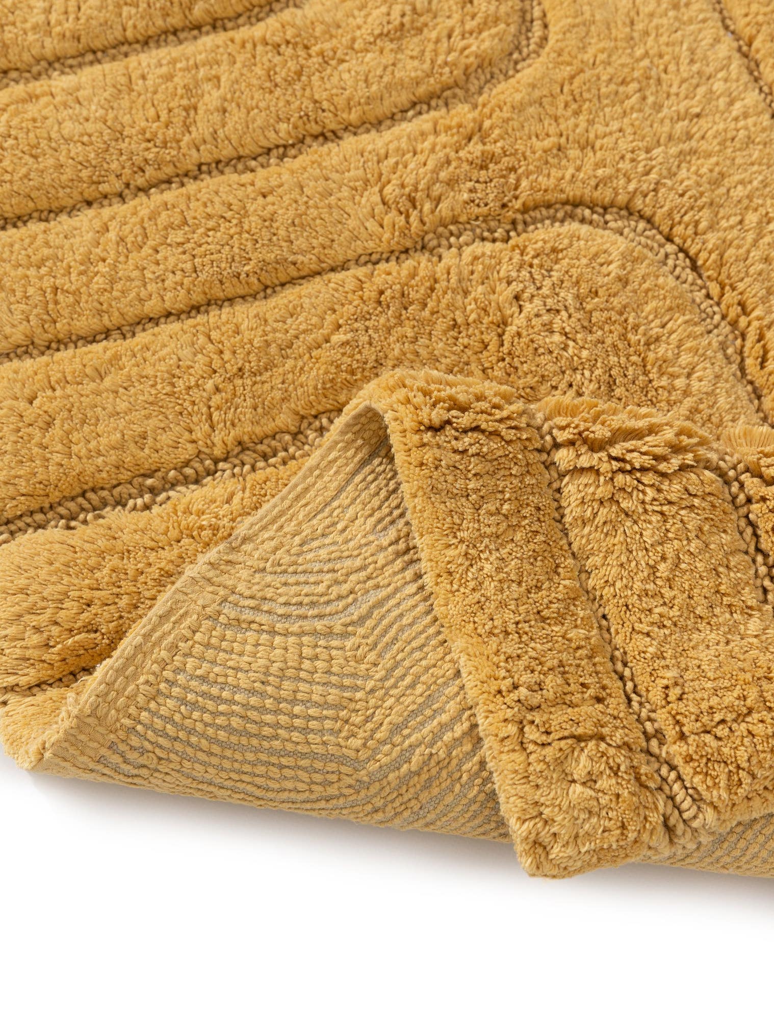 Teppich aus 100% Baumwolle in Gelb mit 11 bis 20 mm hohem Flor von benuta Nest