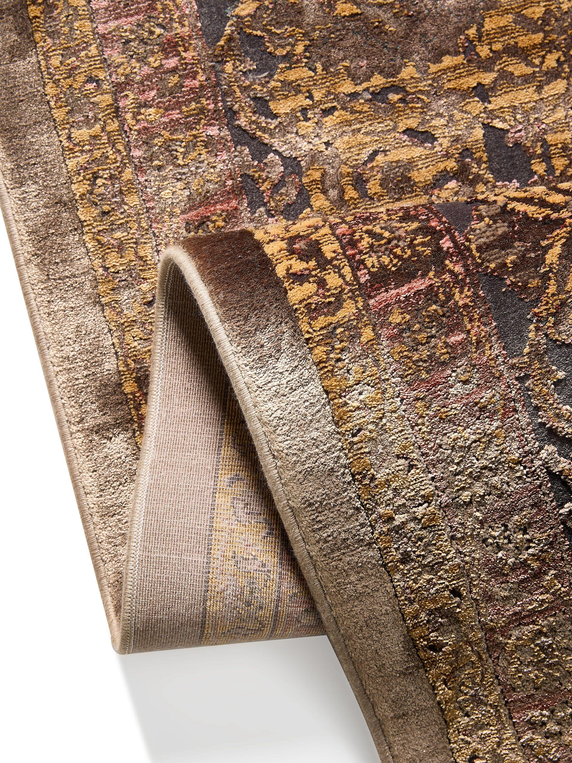 Rug made of 56% Viscose, 30% Polyester, 14% Polyacrylics in Brown with a 1- 5 mm high pile by benuta Finest