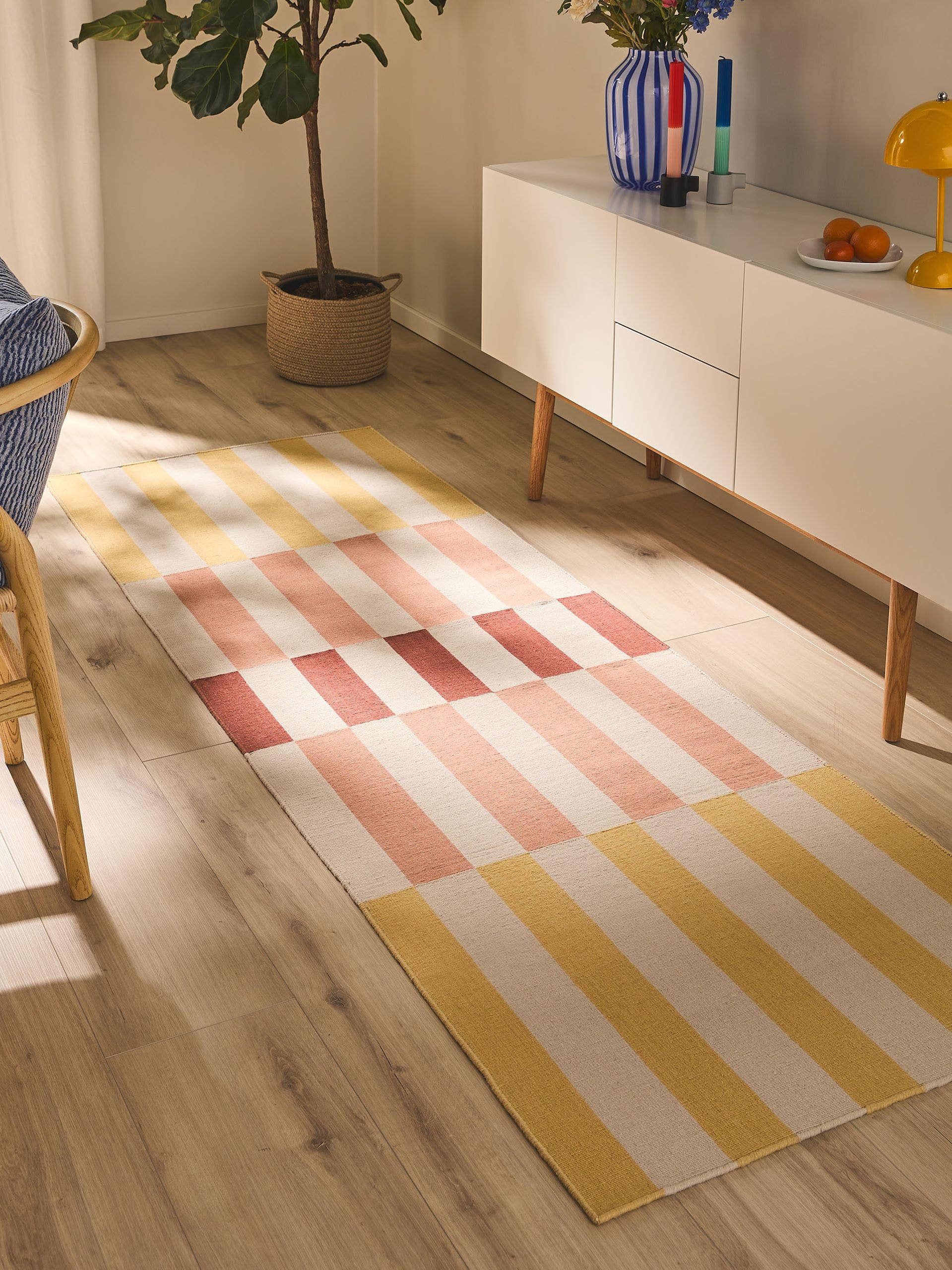Rug made of 100% Wool in Yellow with a 1- 5 mm high pile by benuta Nest