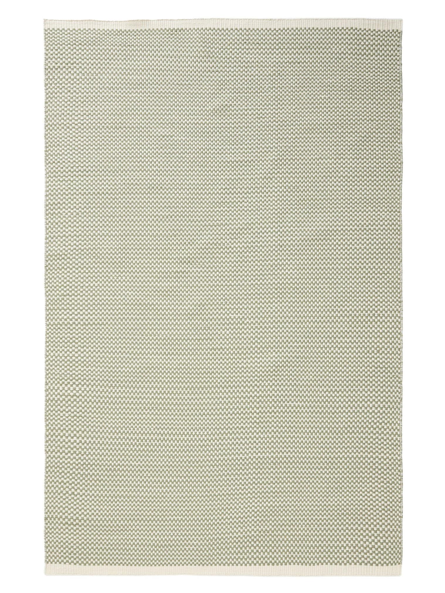 Teppich aus 100% Wolle (aus Neuseeland) in Grün mit bis 5 mm hohem Flor von benuta Pure