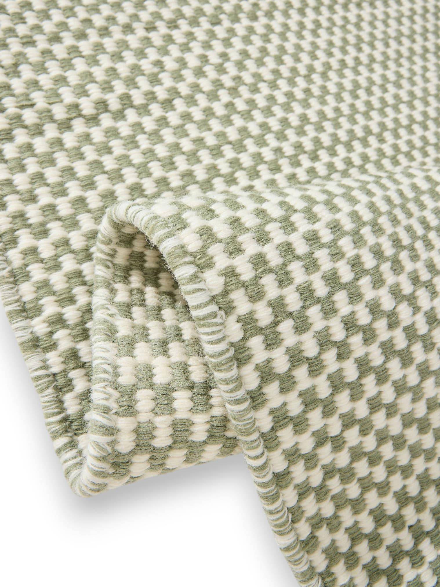 Teppich aus 100% Wolle (aus Neuseeland) in Grün mit bis 5 mm hohem Flor von benuta Pure