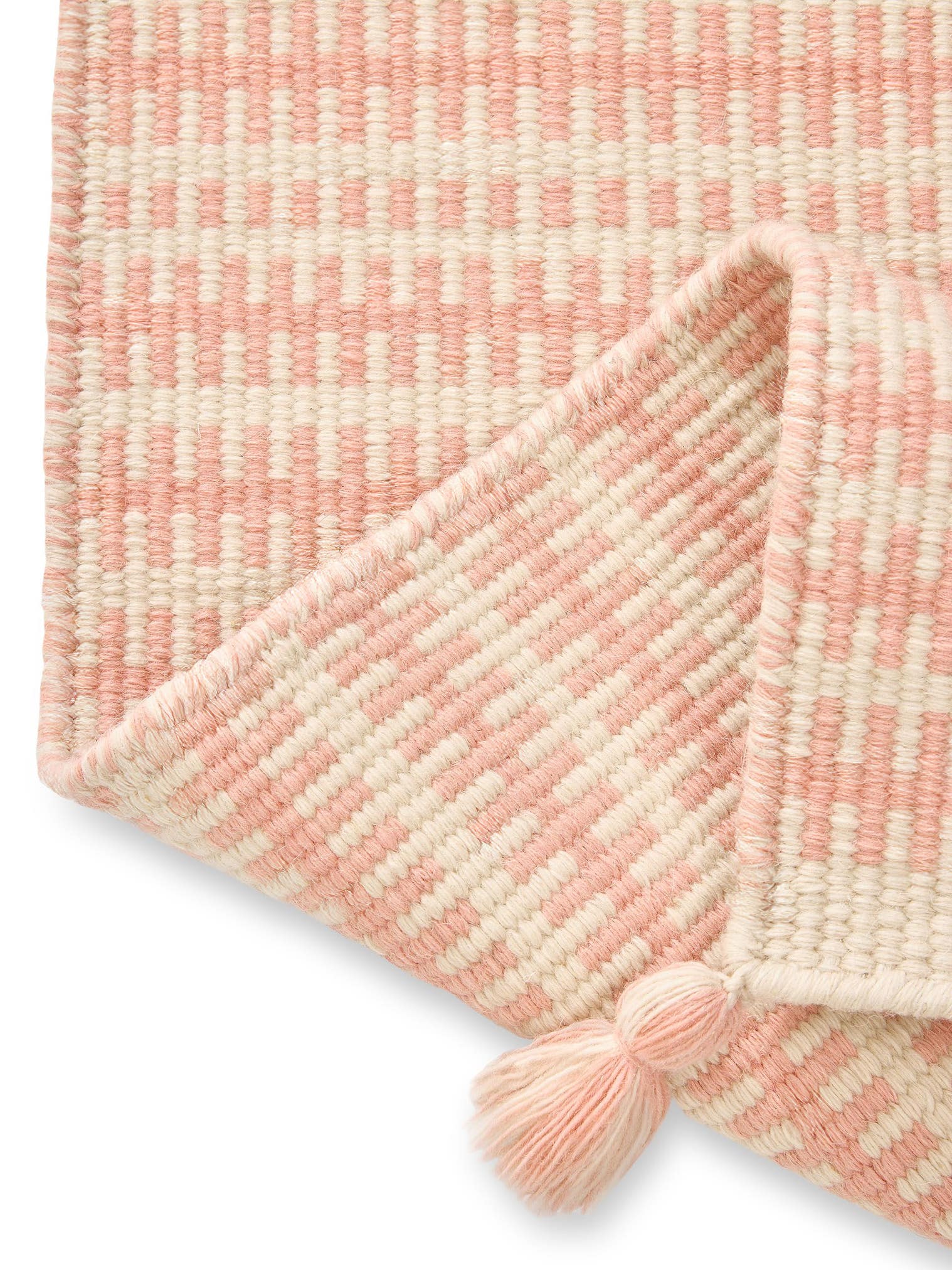Teppich aus 100% Wolle in Rosa mit bis 5 mm hohem Flor von Lytte