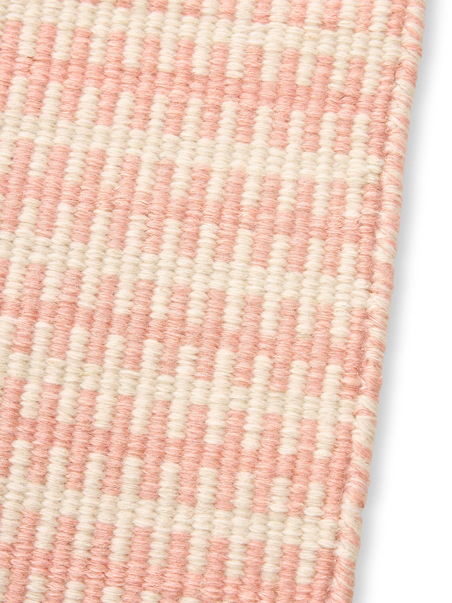 Teppich aus 100% Wolle in Rosa mit bis 5 mm hohem Flor von Lytte