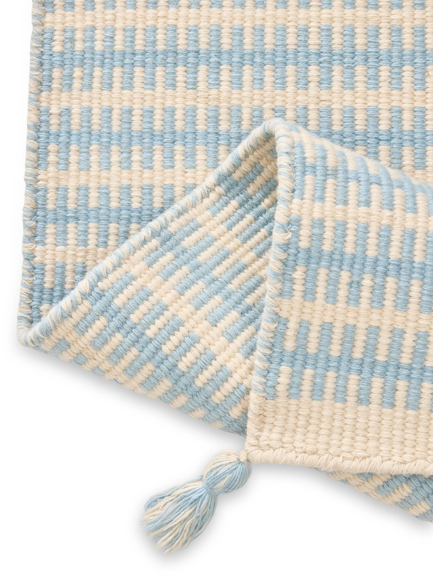 Teppich aus 100% Wolle in Blau mit bis 5 mm hohem Flor von Lytte