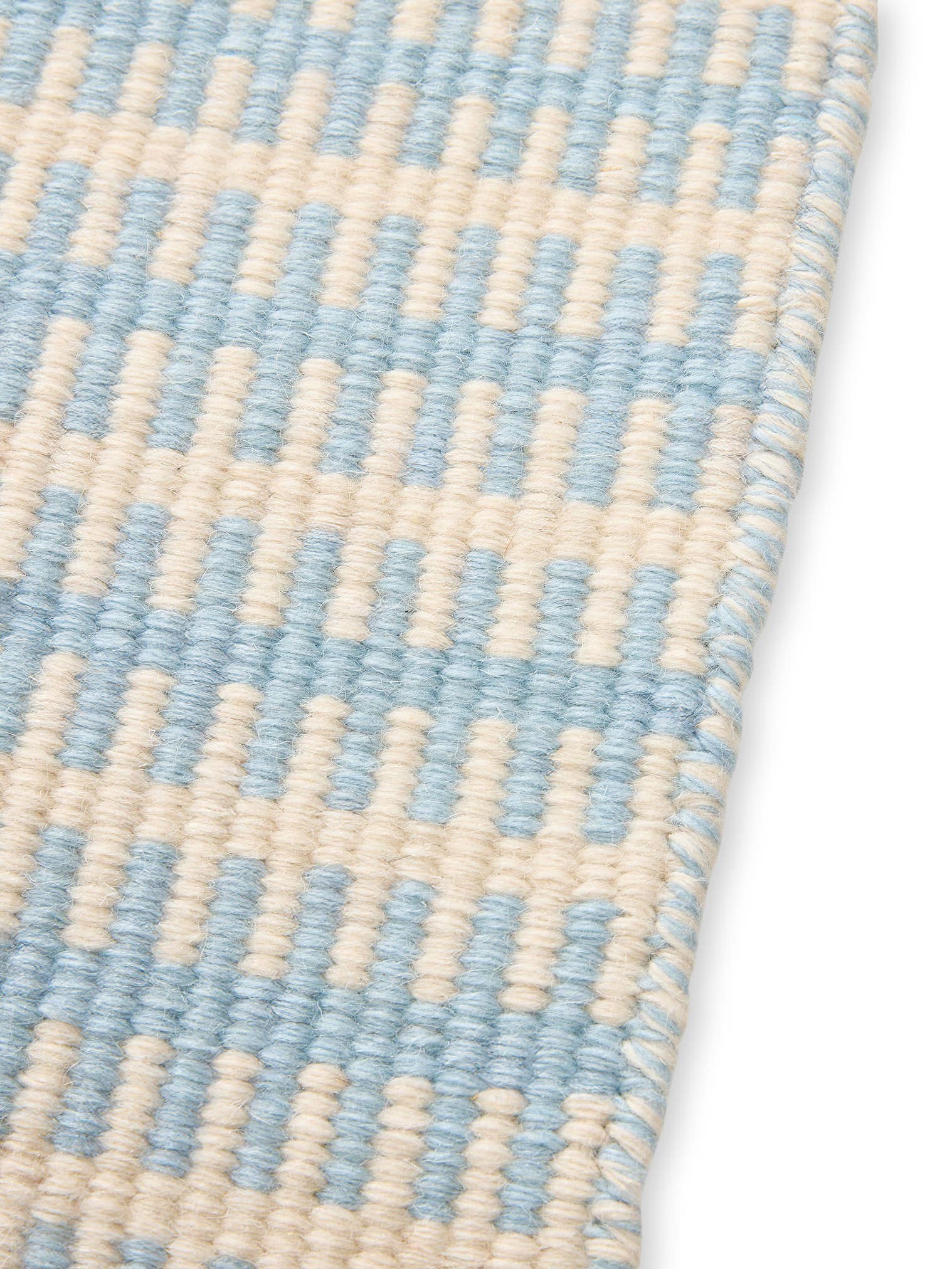 Teppich aus 100% Wolle in Blau mit bis 5 mm hohem Flor von Lytte