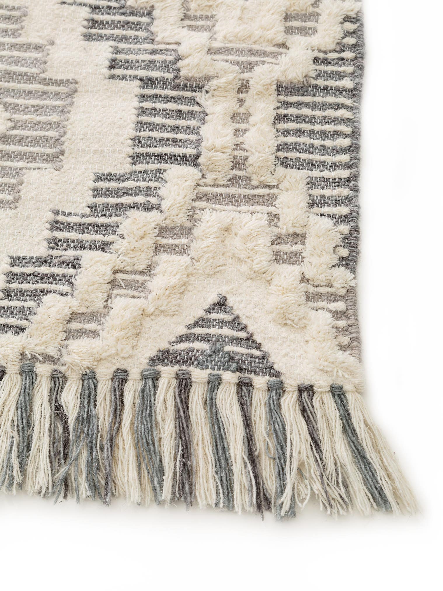 Teppich aus 70% Wolle, 30% Polyester in Grau mit 6 bis 10 mm hohem Flor von Lytte