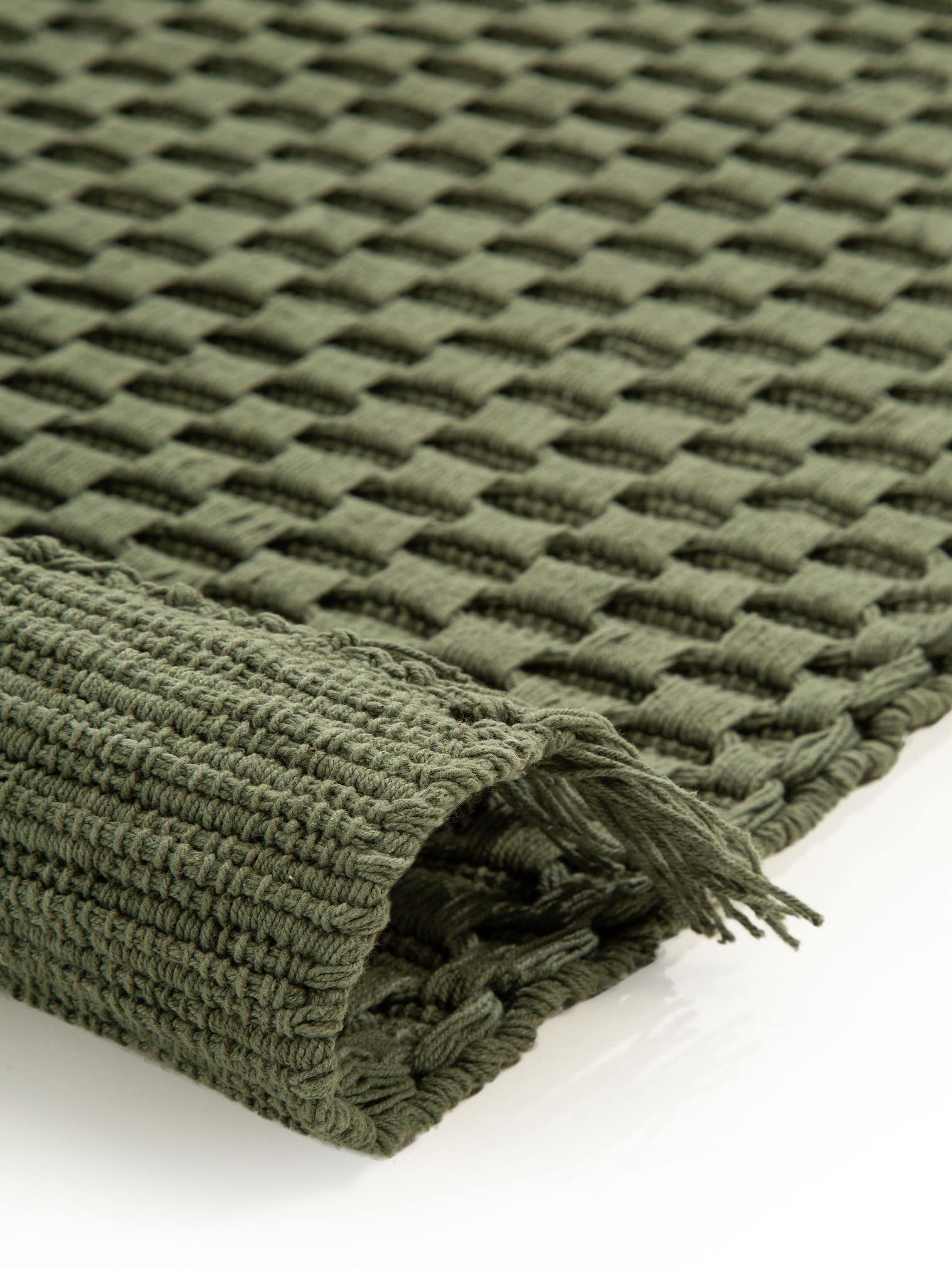 Teppich aus 100% Baumwolle in Grün mit 11 bis 20 mm hohem Flor von benuta Nest